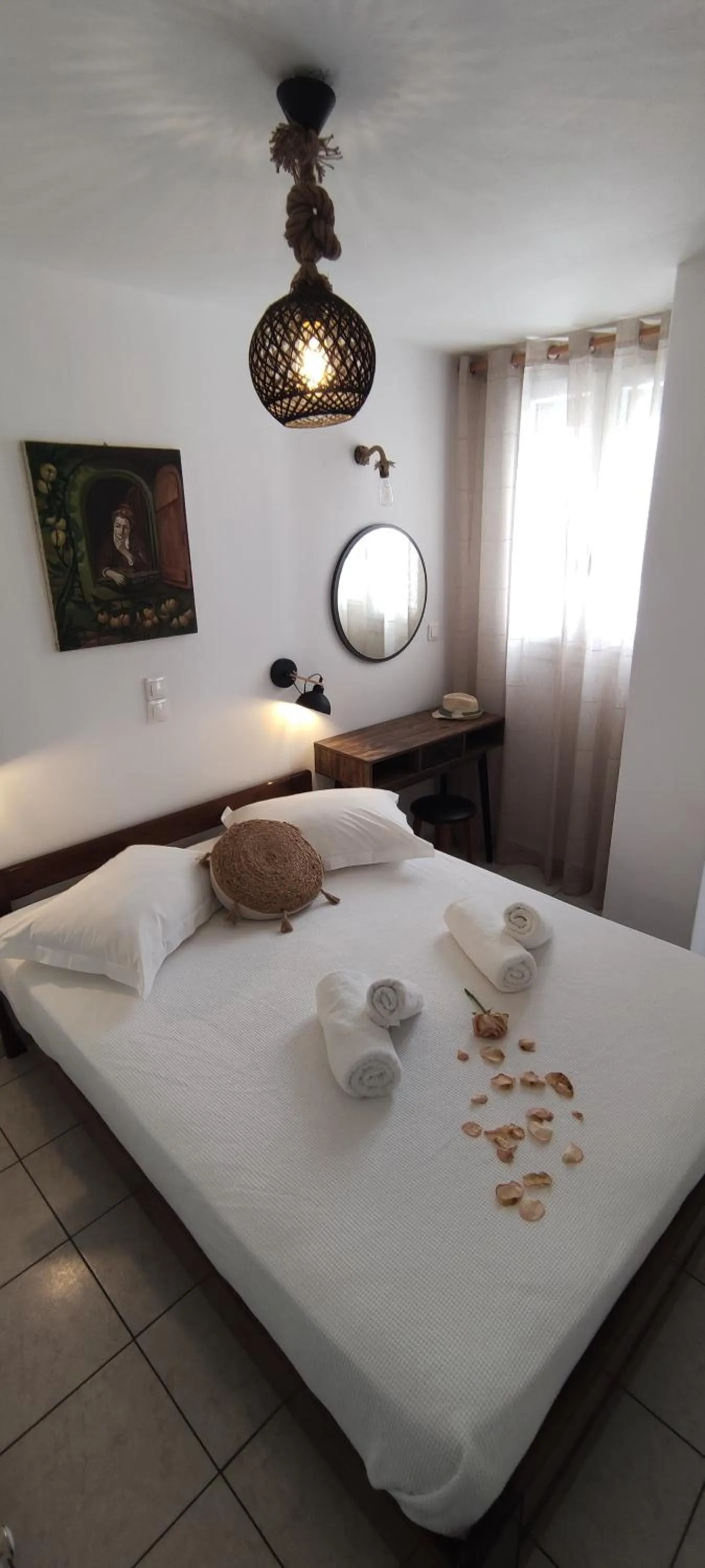 Bed in Kapetanos Rooms