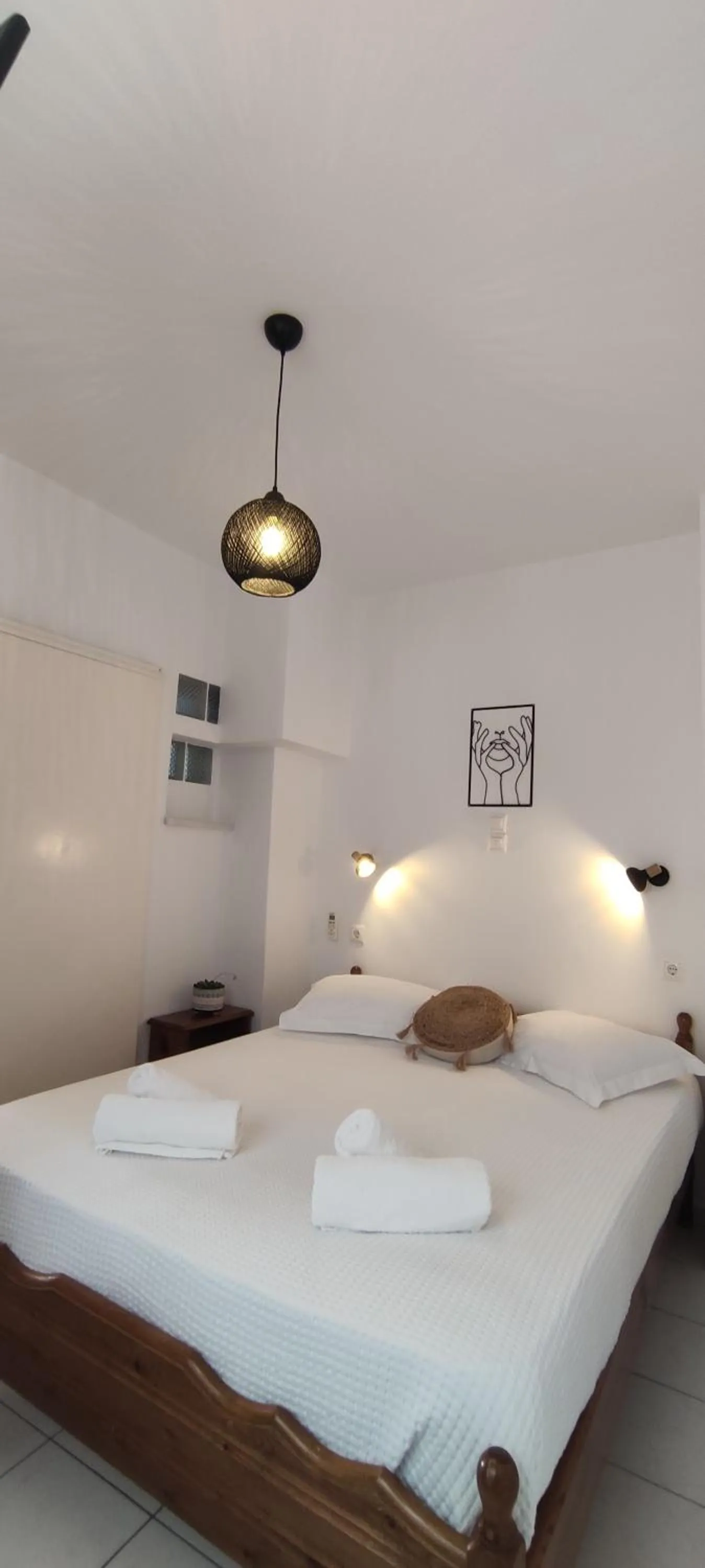 Bed in Kapetanos Rooms