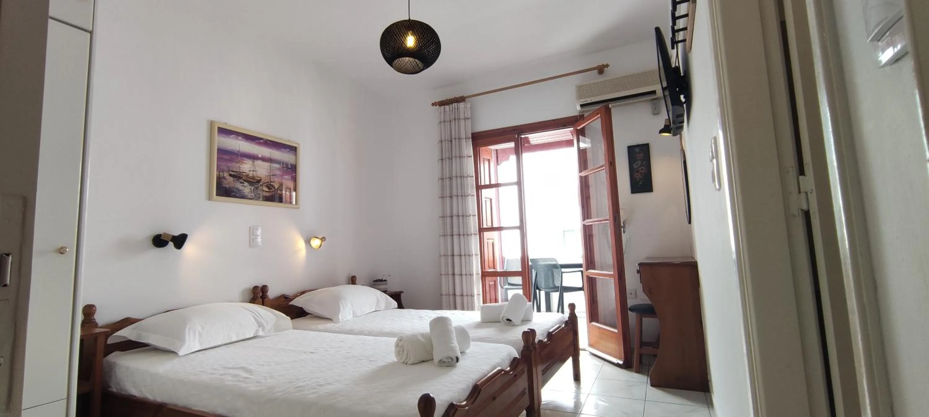 Bed in Kapetanos Rooms