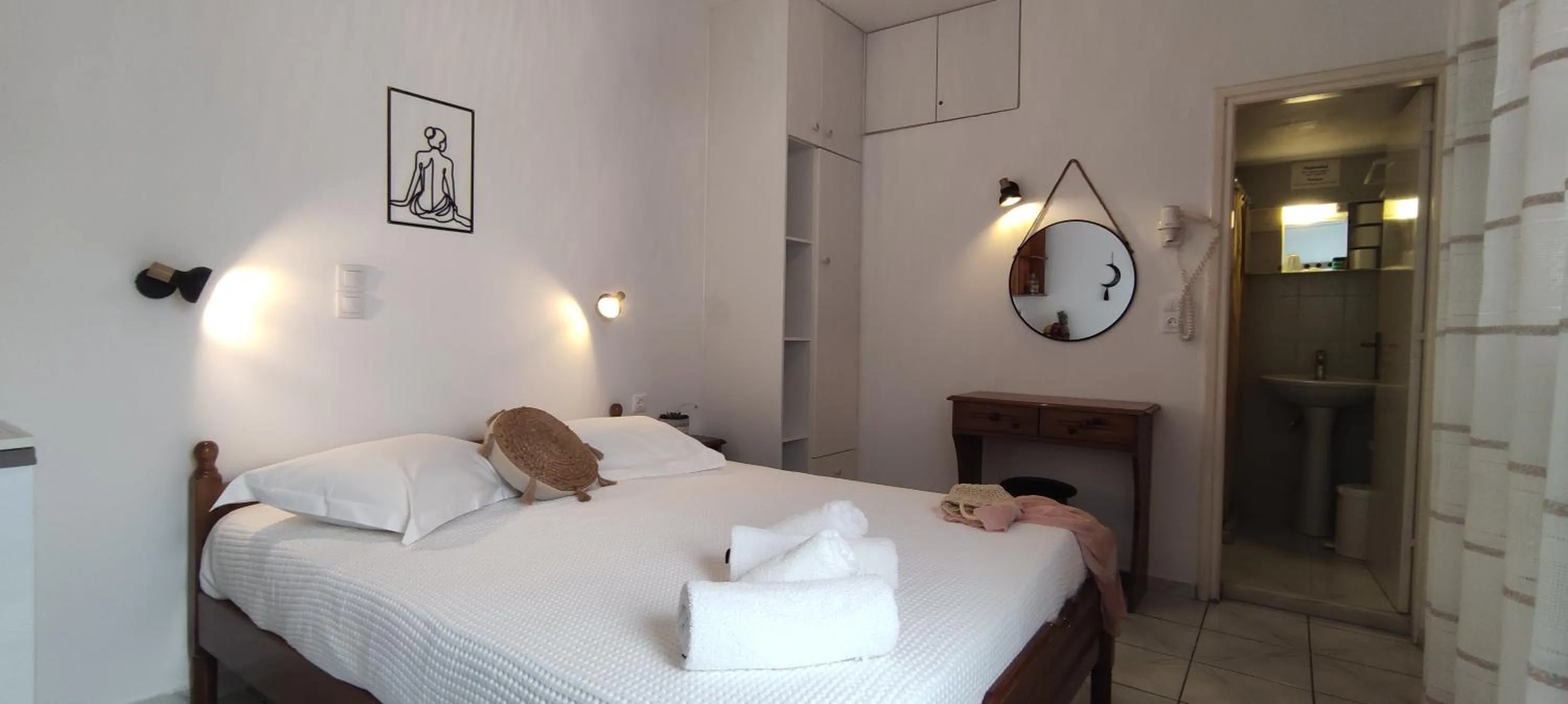 Bed in Kapetanos Rooms