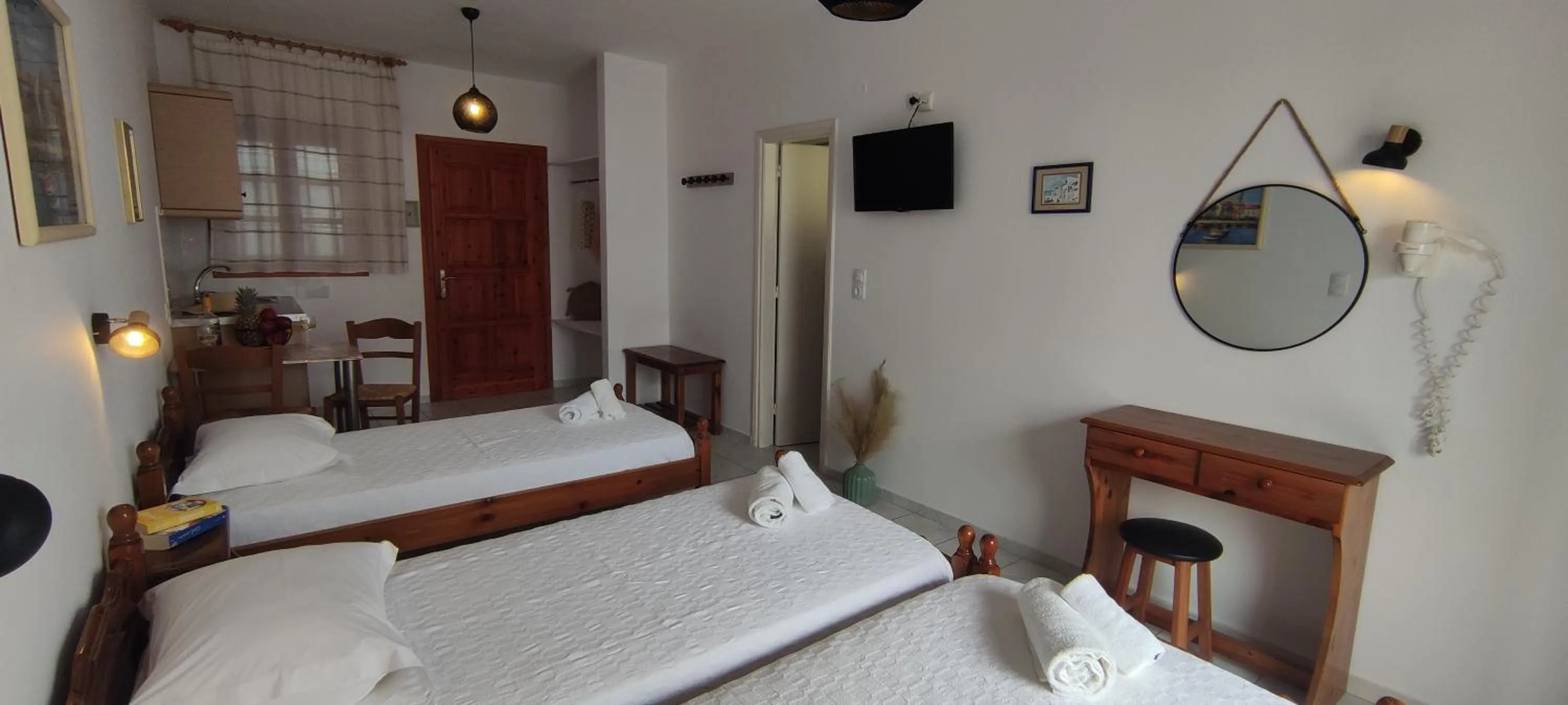 Bed in Kapetanos Rooms