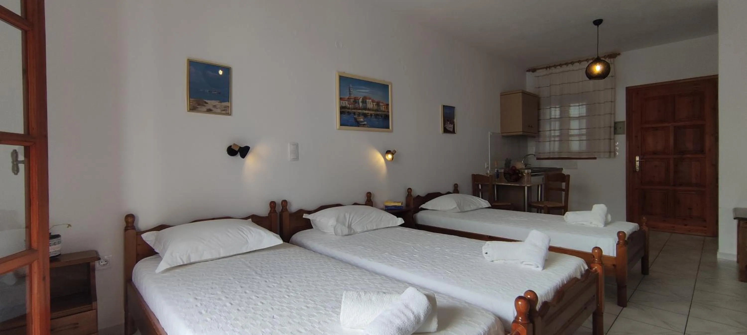 Bed in Kapetanos Rooms