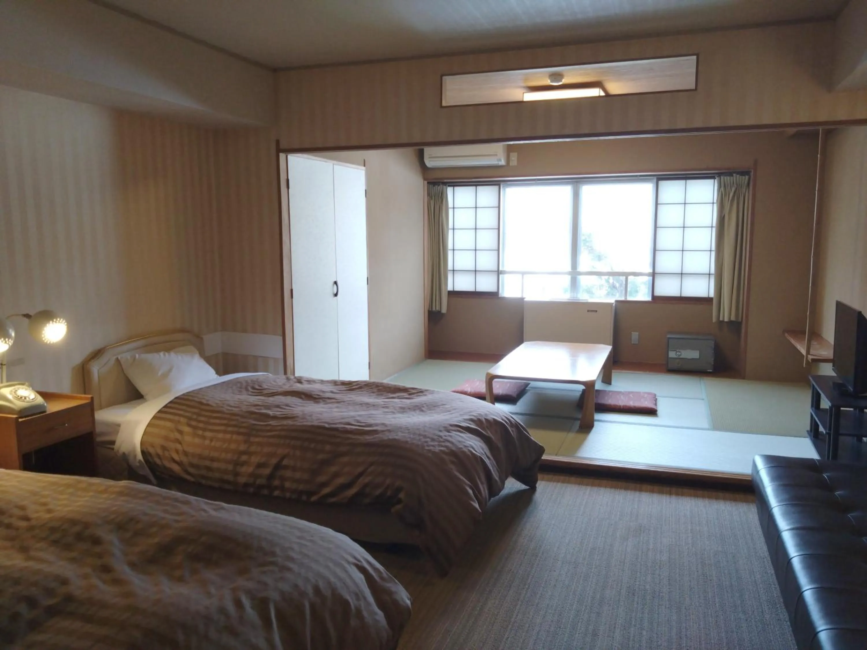 Bed in Shirakabako View Hotel
