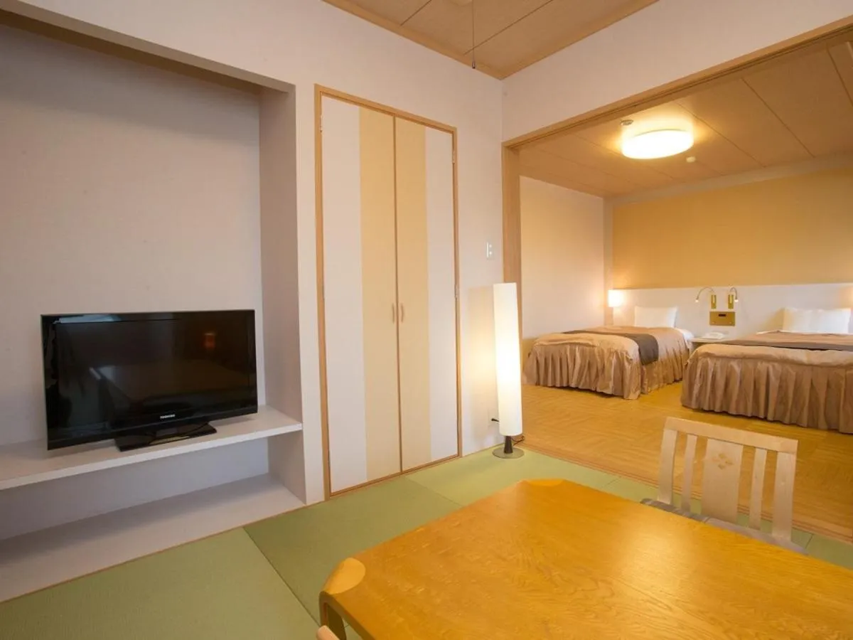 Photo of the whole room, Bed in Itoen Hotel Kusatsu