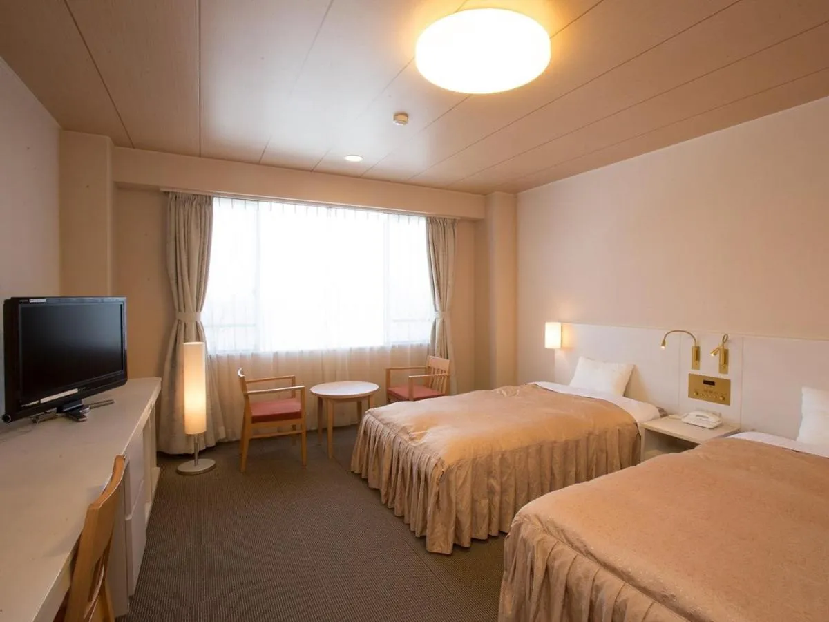 Photo of the whole room, Bed in Itoen Hotel Kusatsu