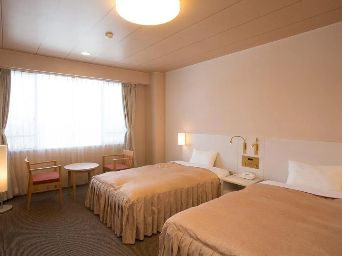 Bed in Itoen Hotel Kusatsu