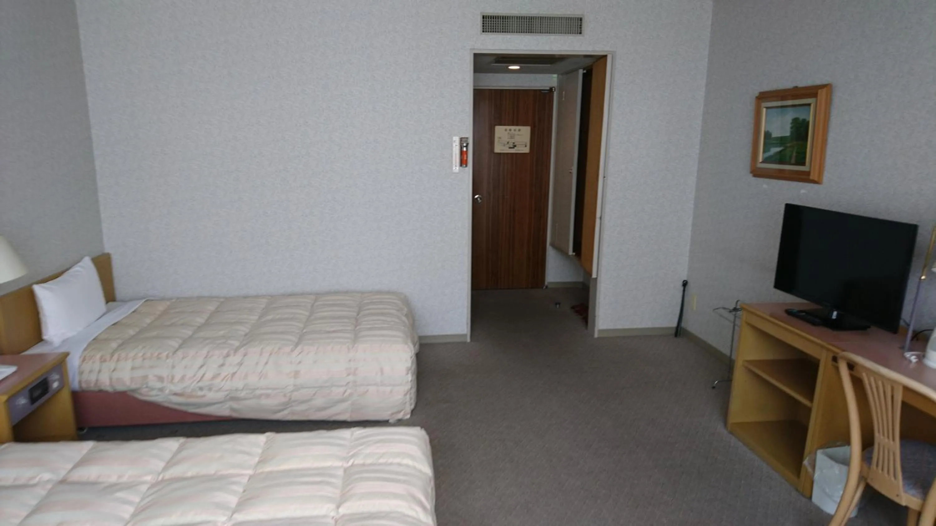 Bed in Itoen Hotel Kusatsu