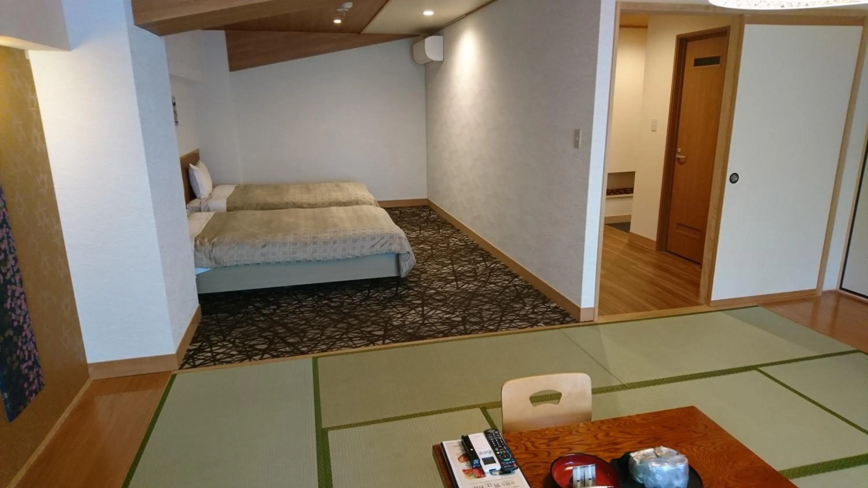 Bed in Itoen Hotel Kusatsu