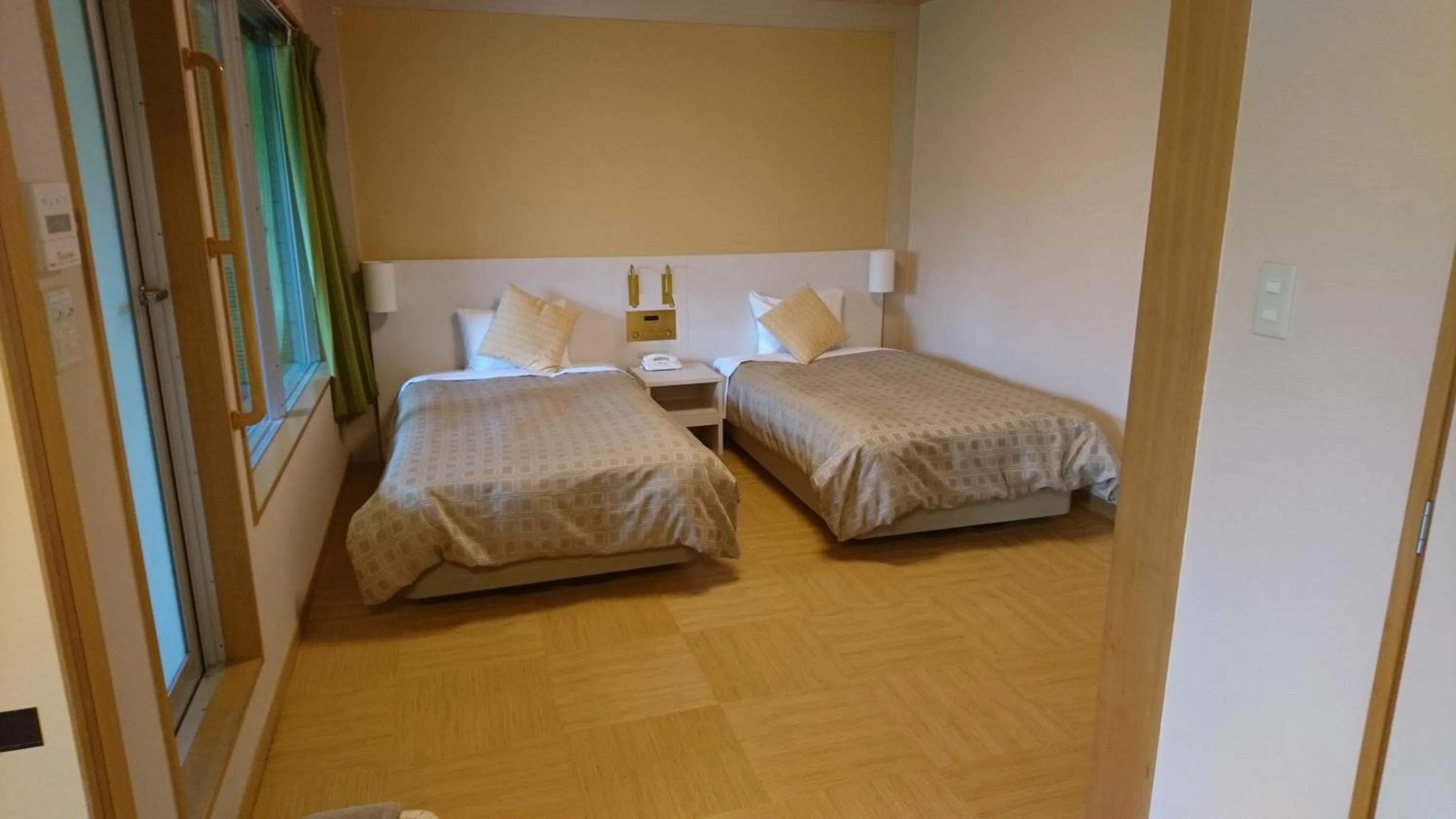 Bed in Itoen Hotel Kusatsu