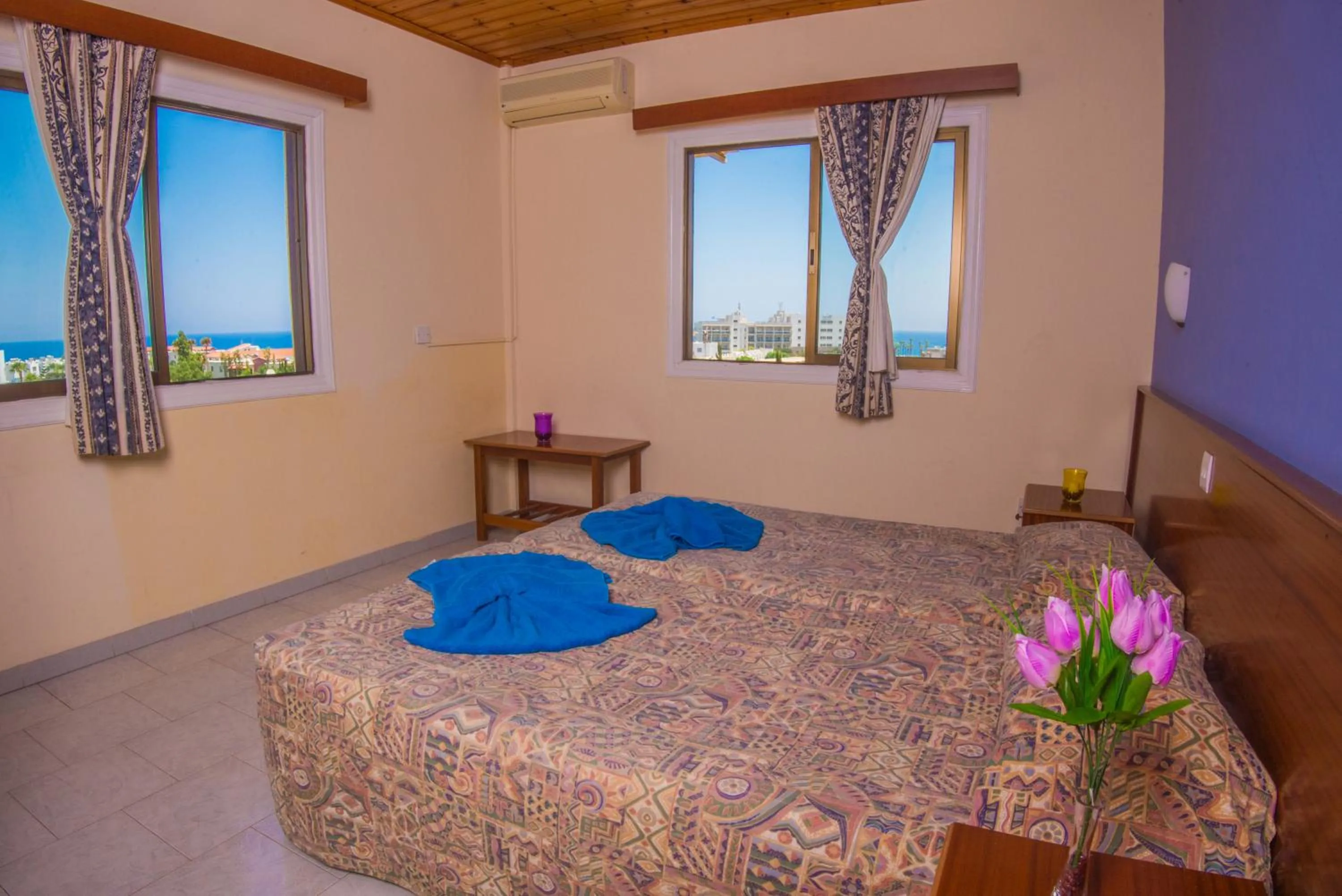 Bed in Windmills Hotel Apartments