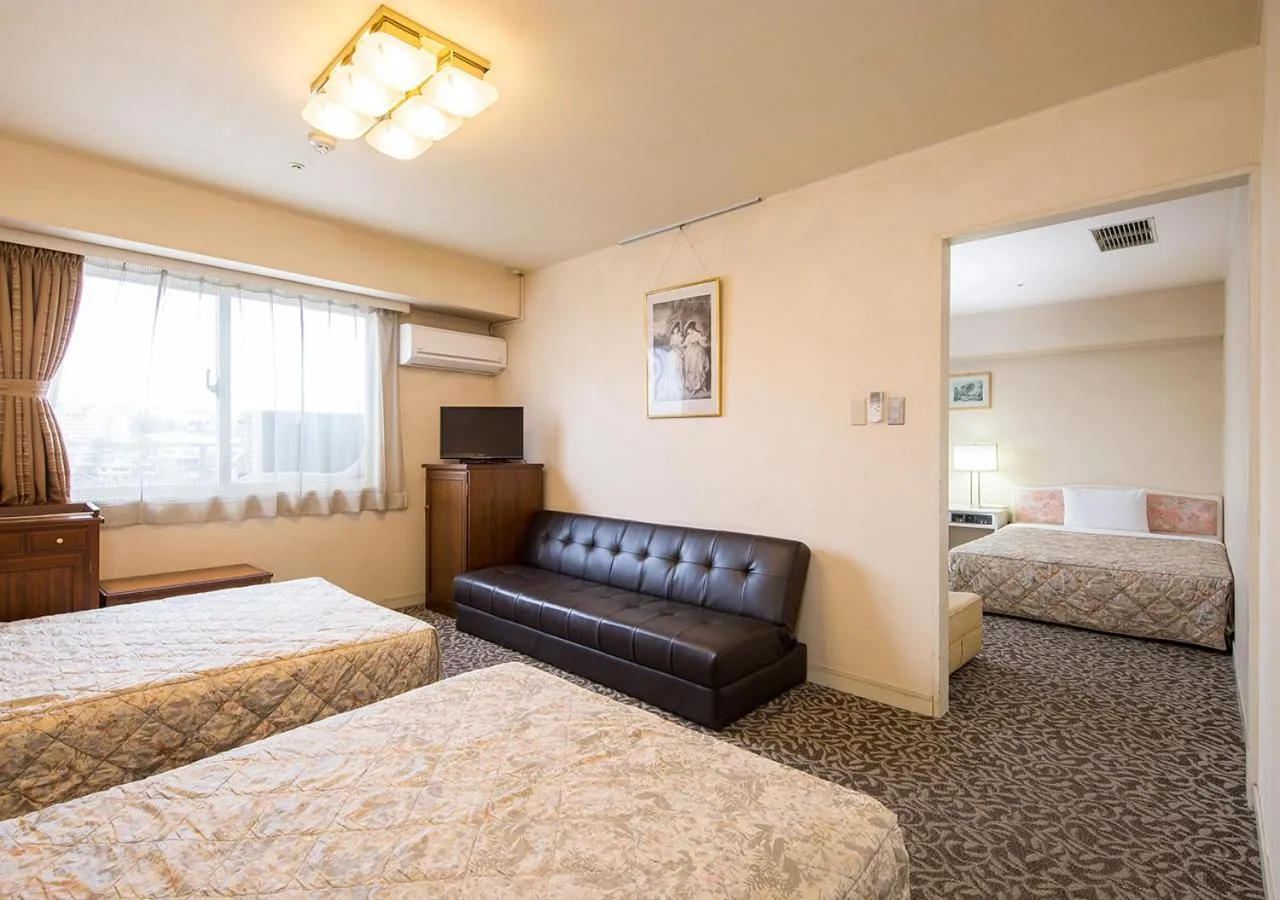 Bed in Komoro Grand Castle Hotel