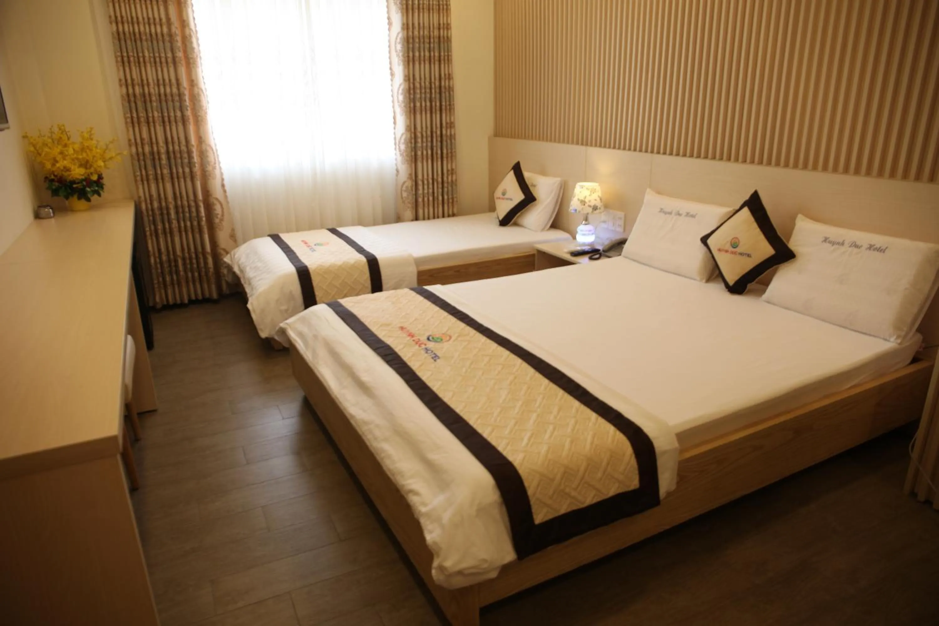 Bed in Huynh Duc 2 Hotel