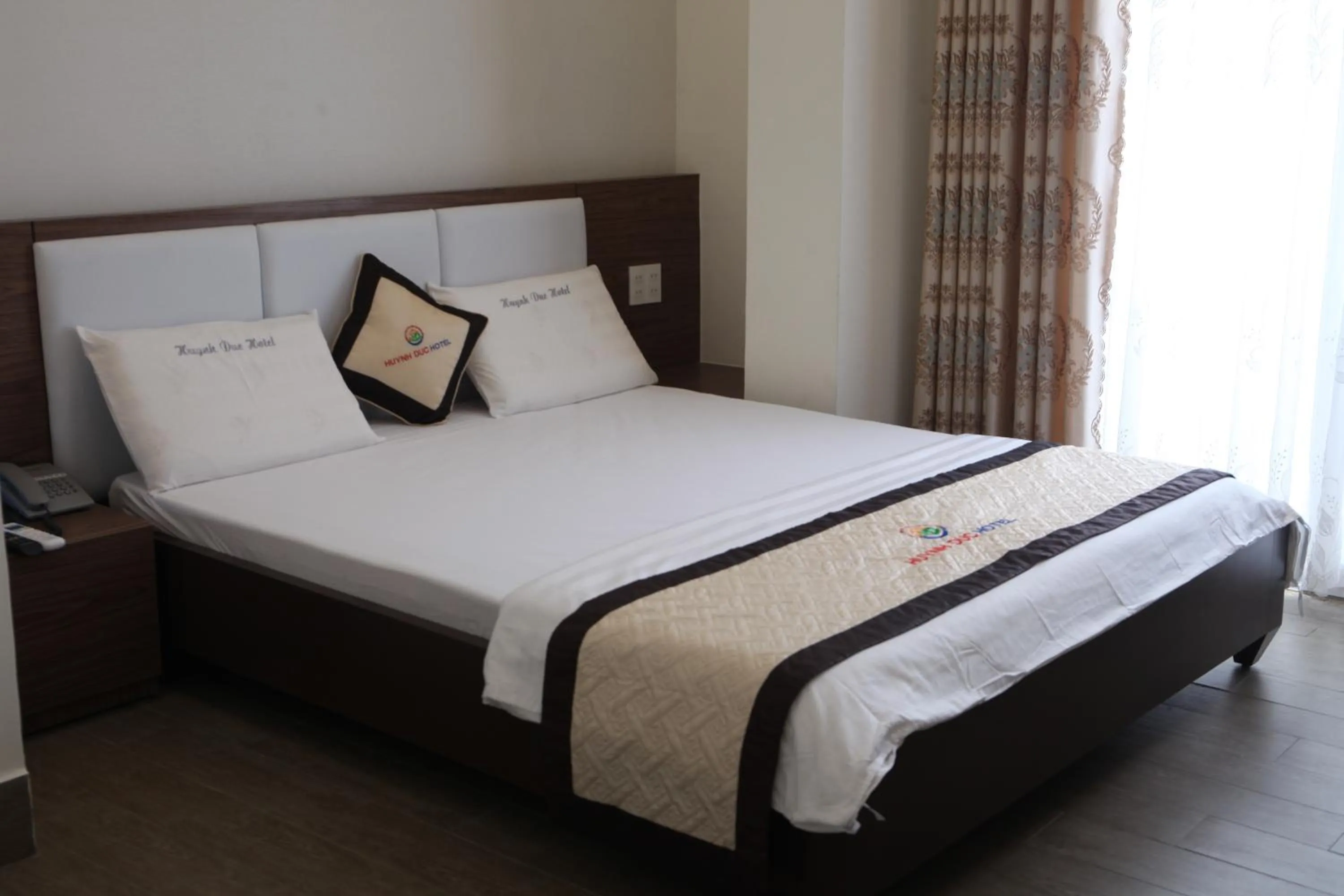 Bed in Huynh Duc 2 Hotel