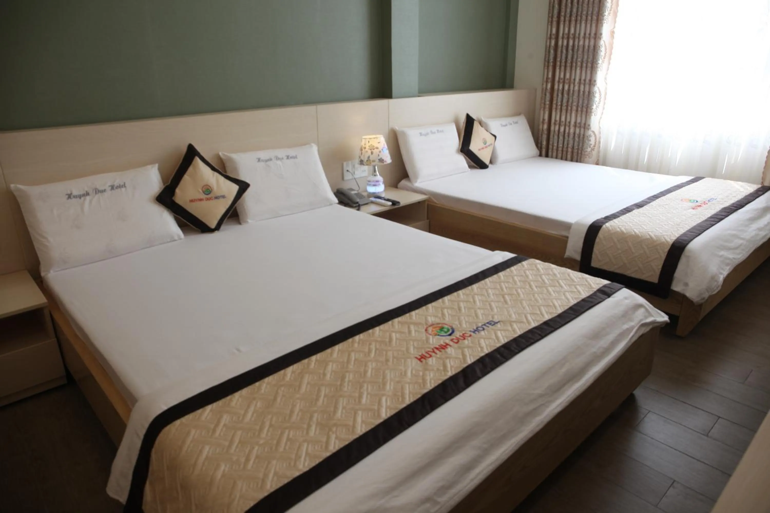 Bed in Huynh Duc 2 Hotel