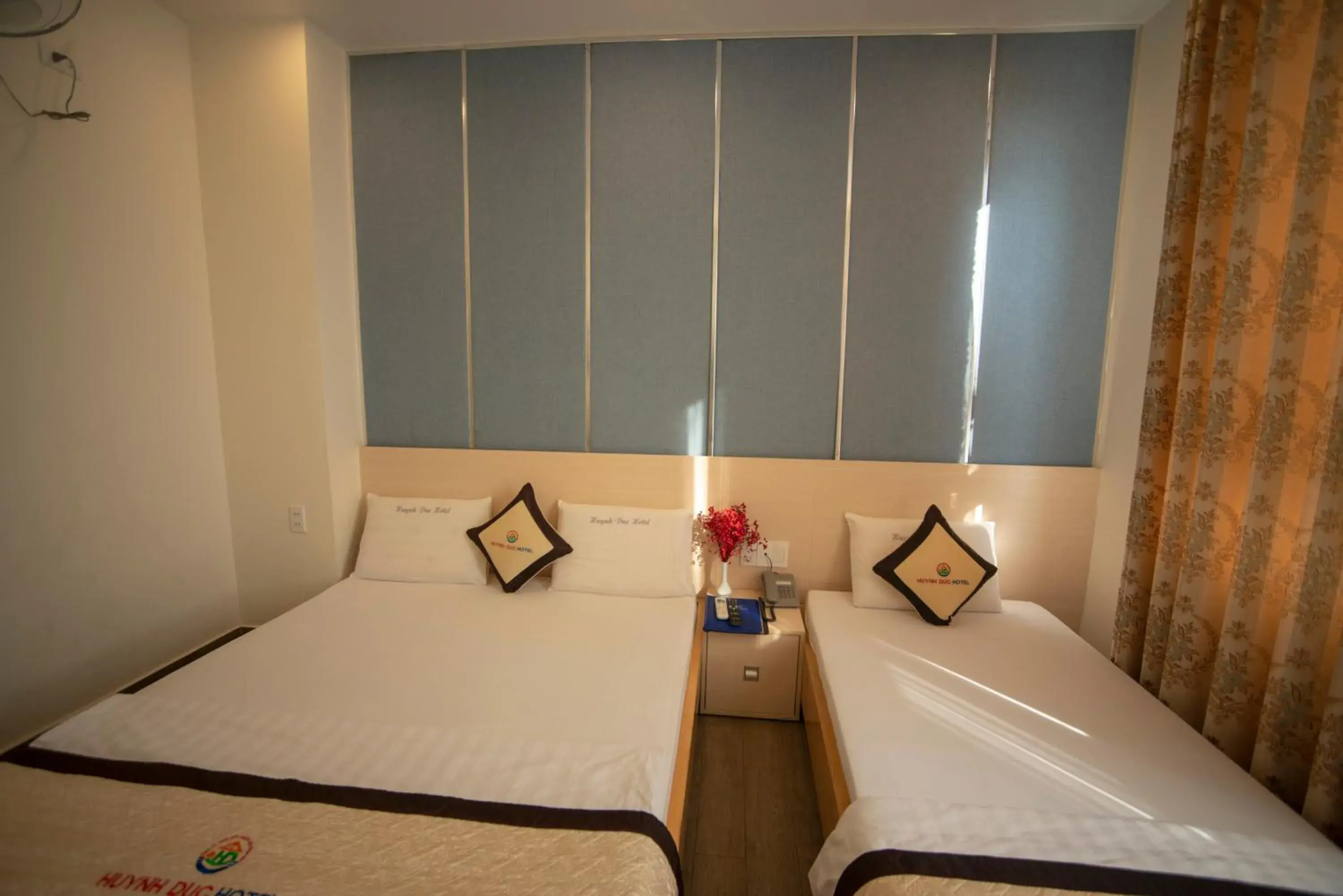 Bed in Huynh Duc 2 Hotel Bed in Huynh Duc 2 Hotel