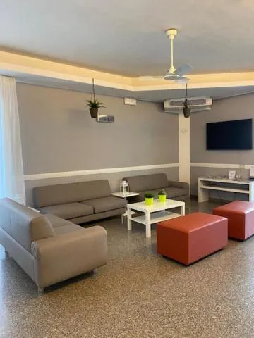 Communal lounge/ TV room in Residence Hotel Mizar
