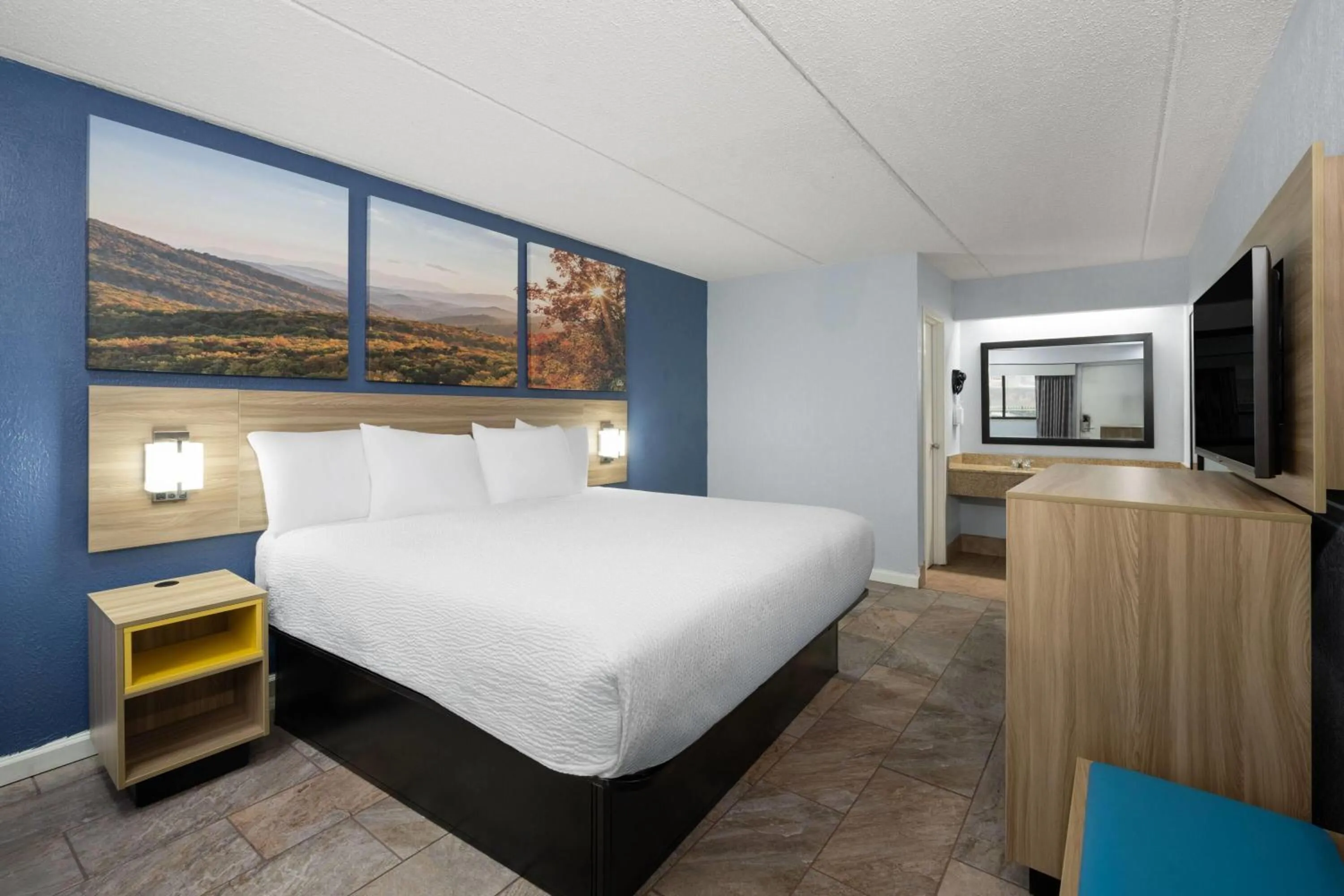 Photo of the whole room, Bed in Days Inn by Wyndham Charlotte University