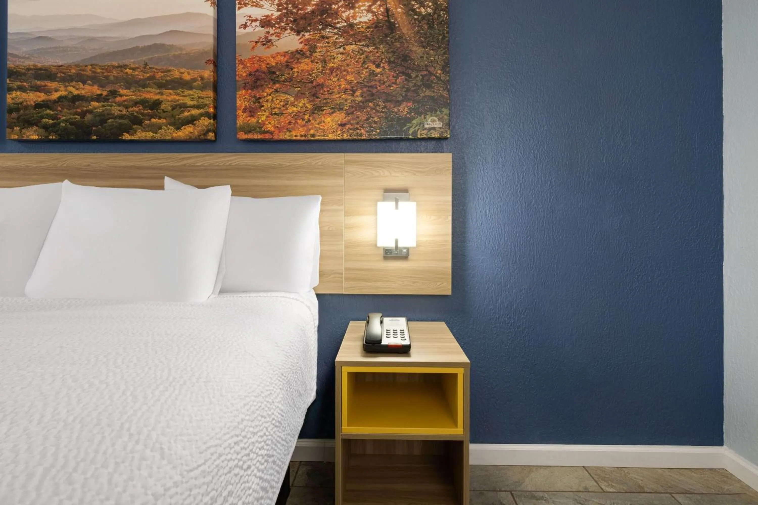 Photo of the whole room, Bed in Days Inn by Wyndham Charlotte University
