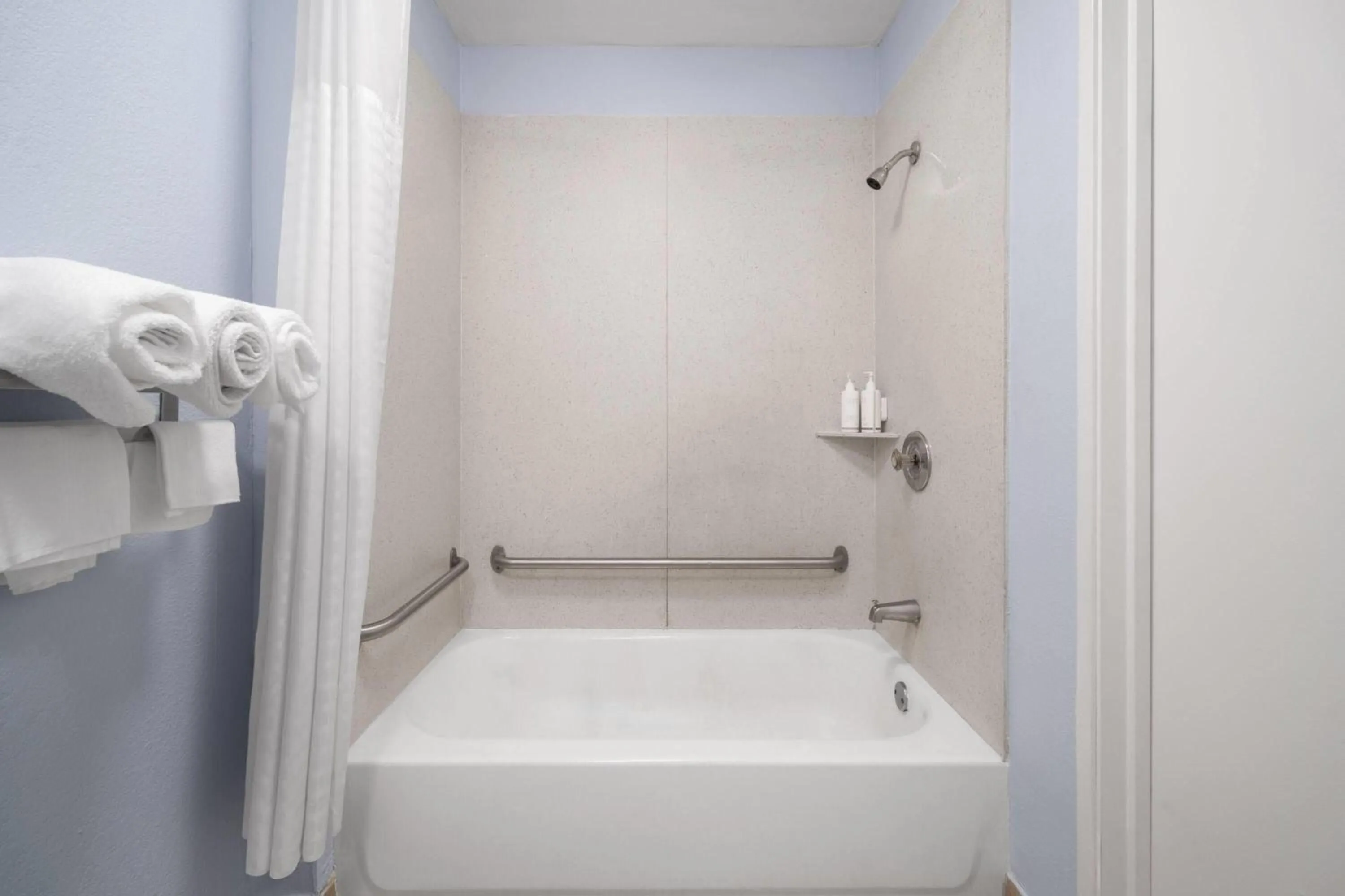 Bathroom in Days Inn by Wyndham Charlotte University