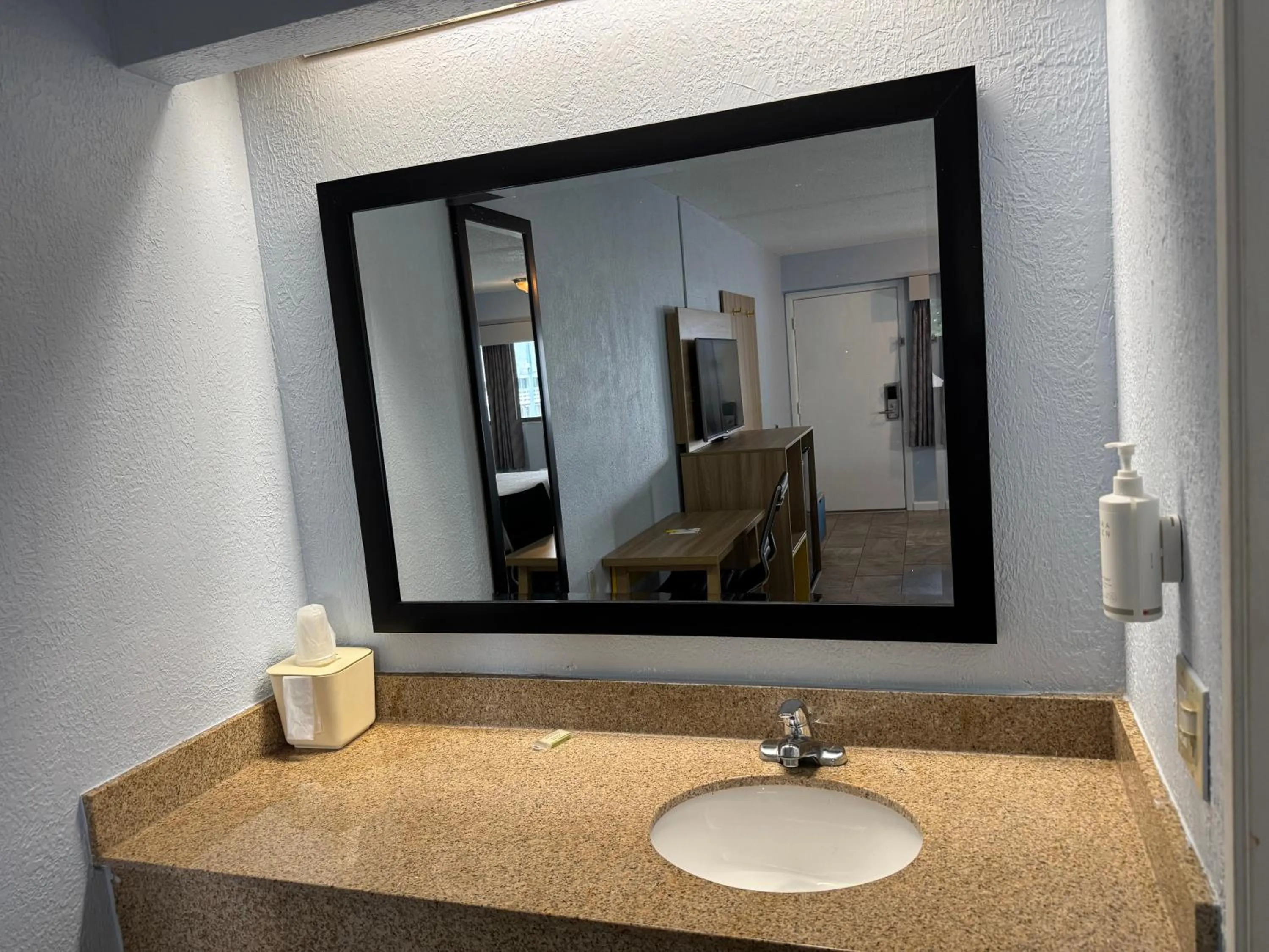 Bathroom in Days Inn by Wyndham Charlotte University