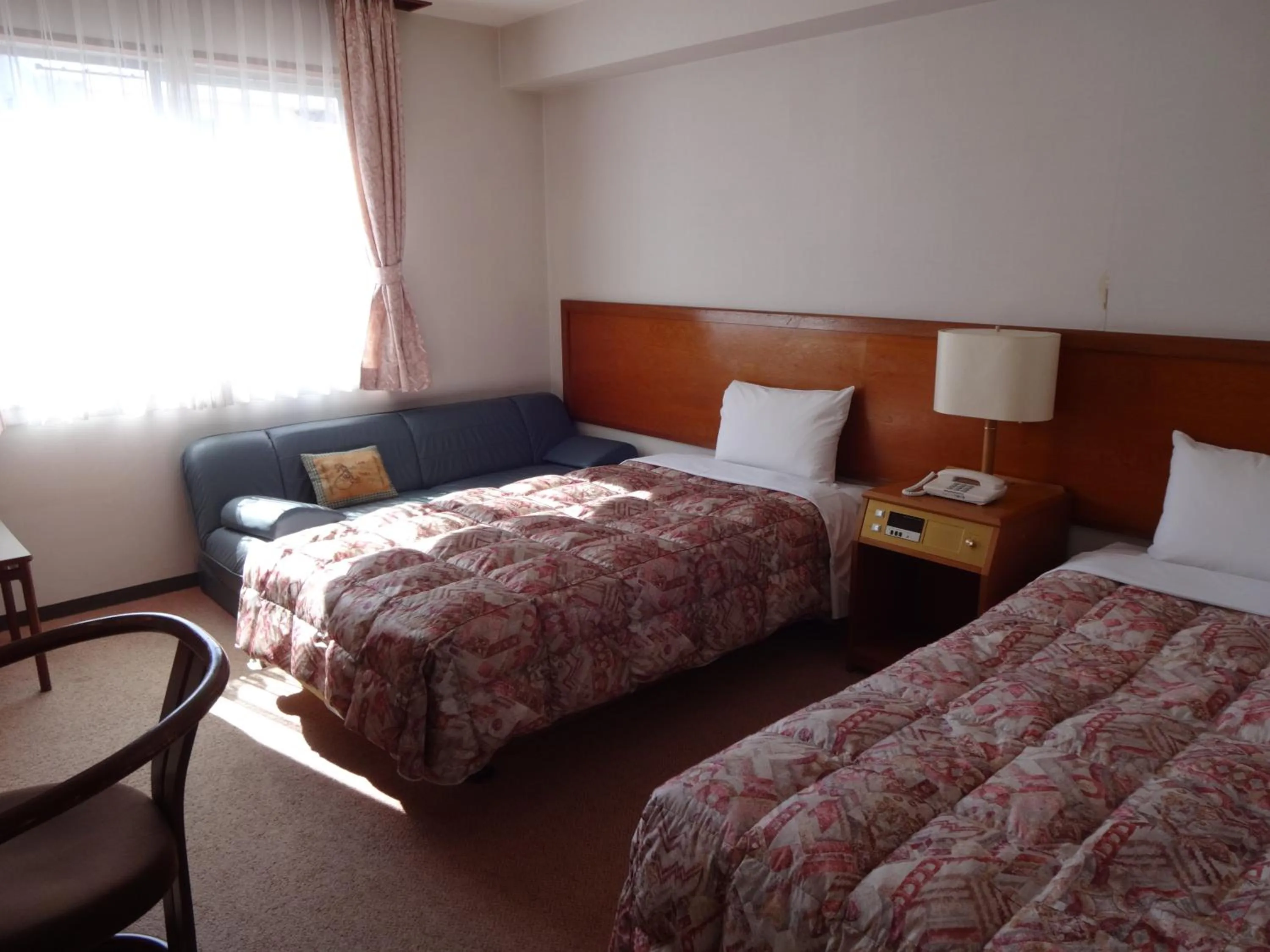 Bed in Akakura Hotel