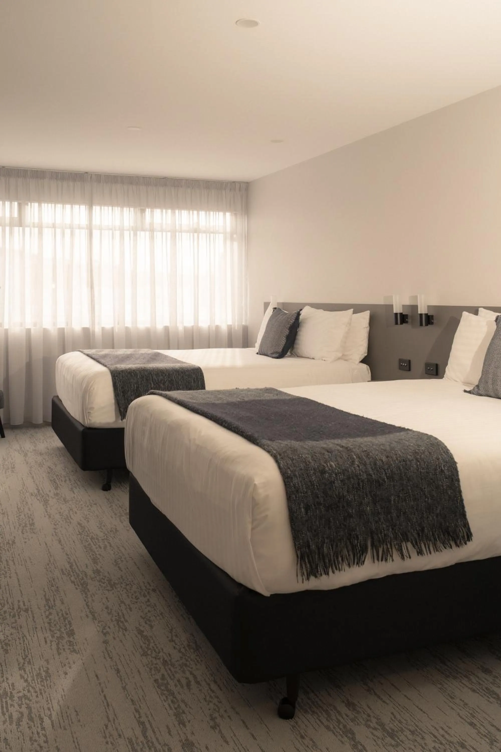 Bed in 429 Apartments & Suites