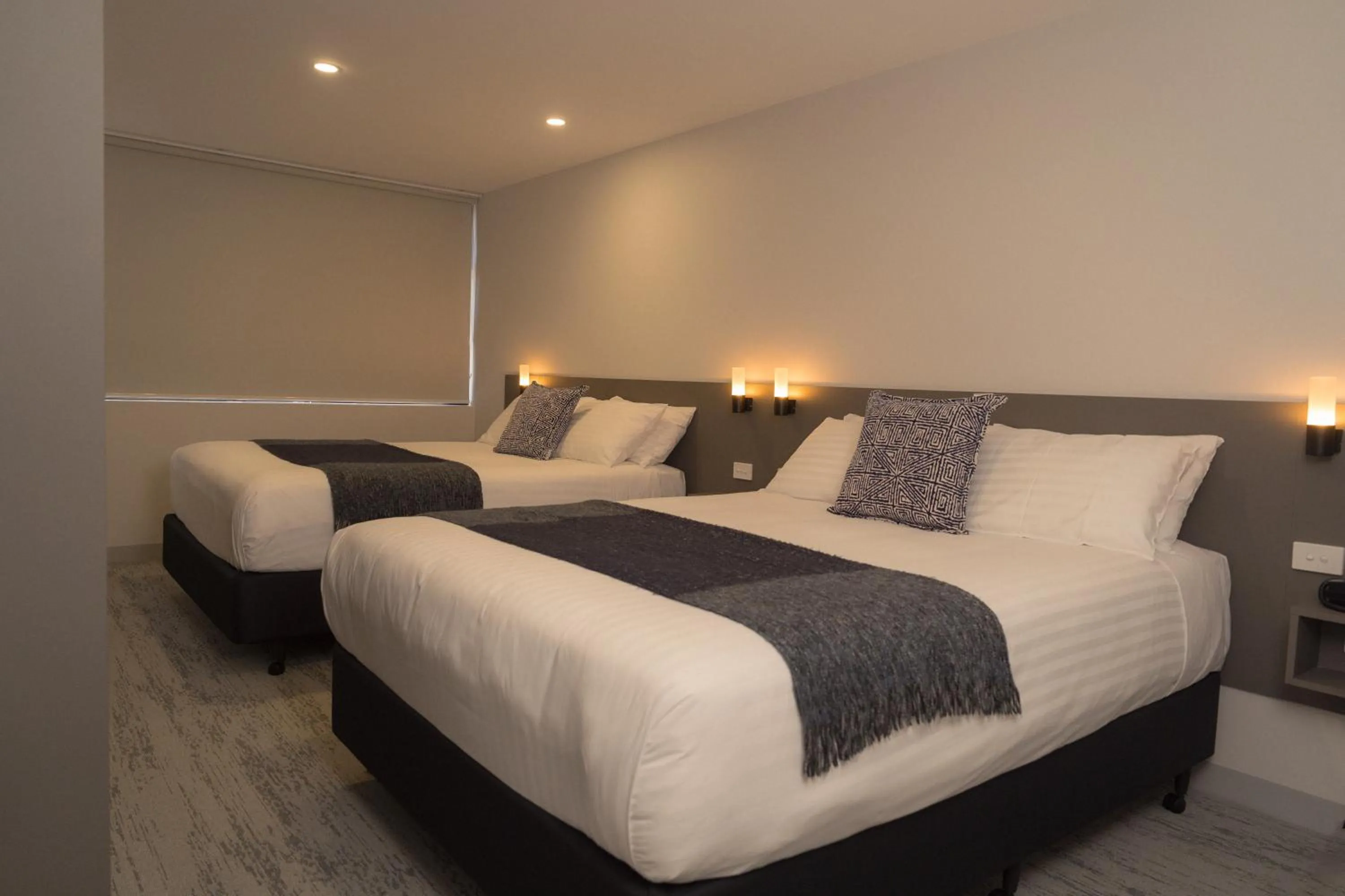 Bed in 429 Apartments & Suites