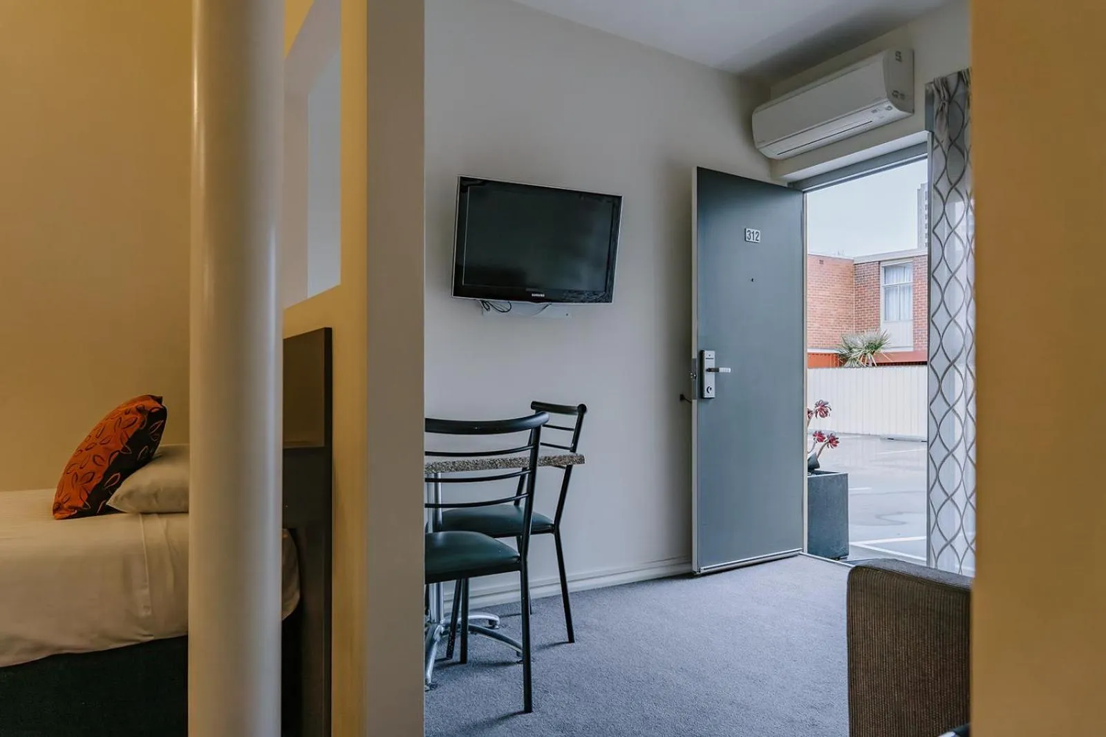 Bed in 429 Apartments & Suites