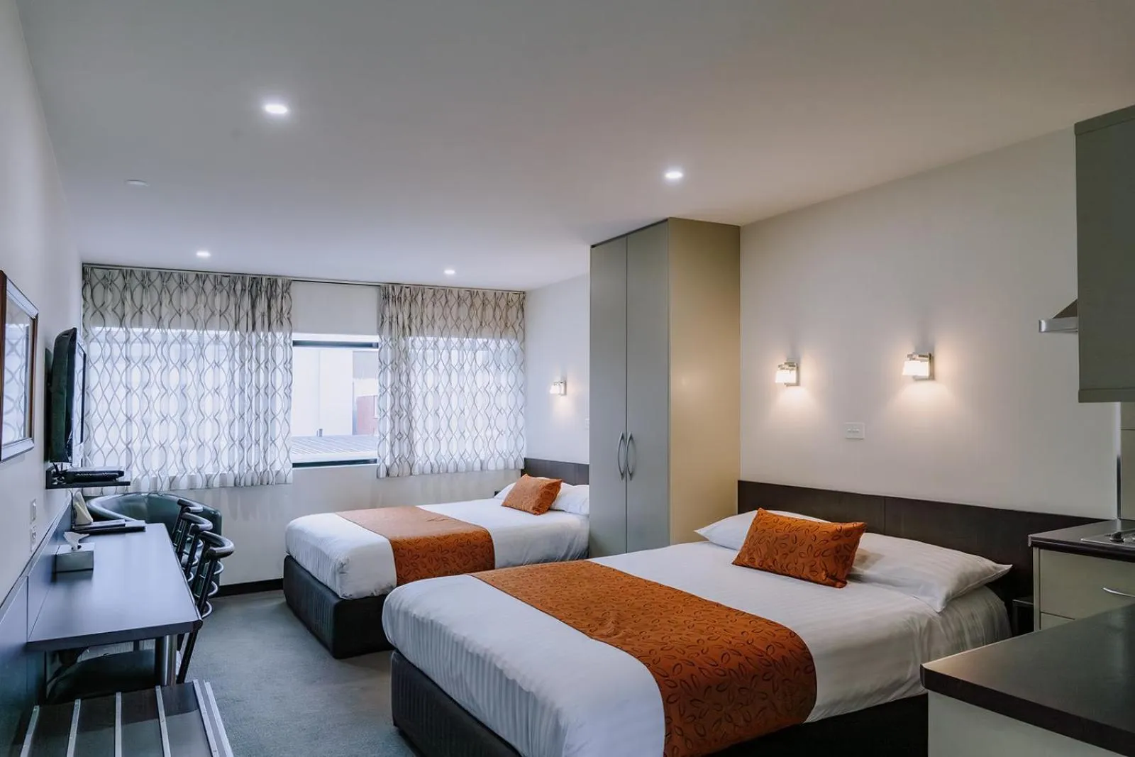 Bed in 429 Apartments & Suites