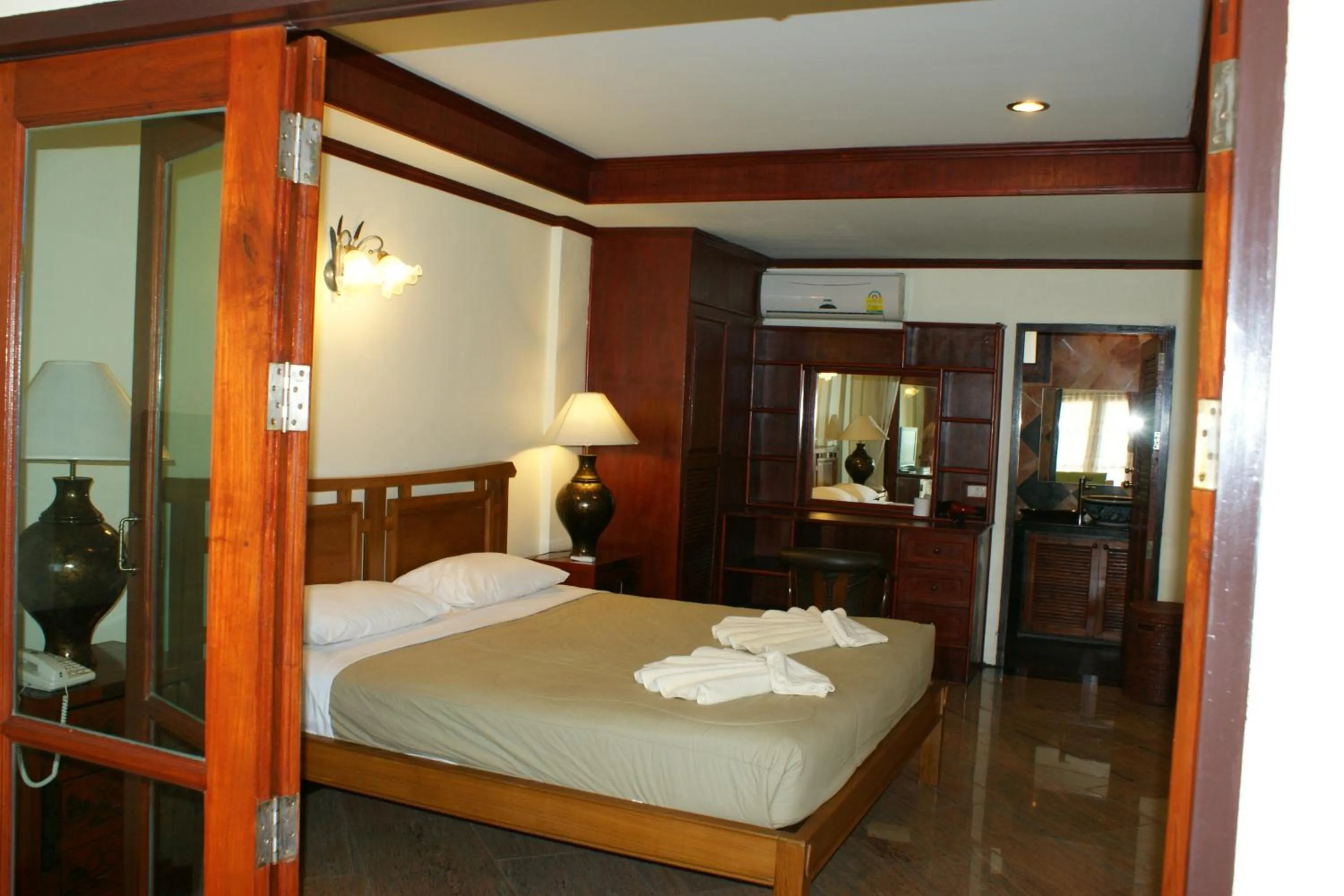 Bed in Prince Edouard Apartments & Resort Patong Beach Phuket