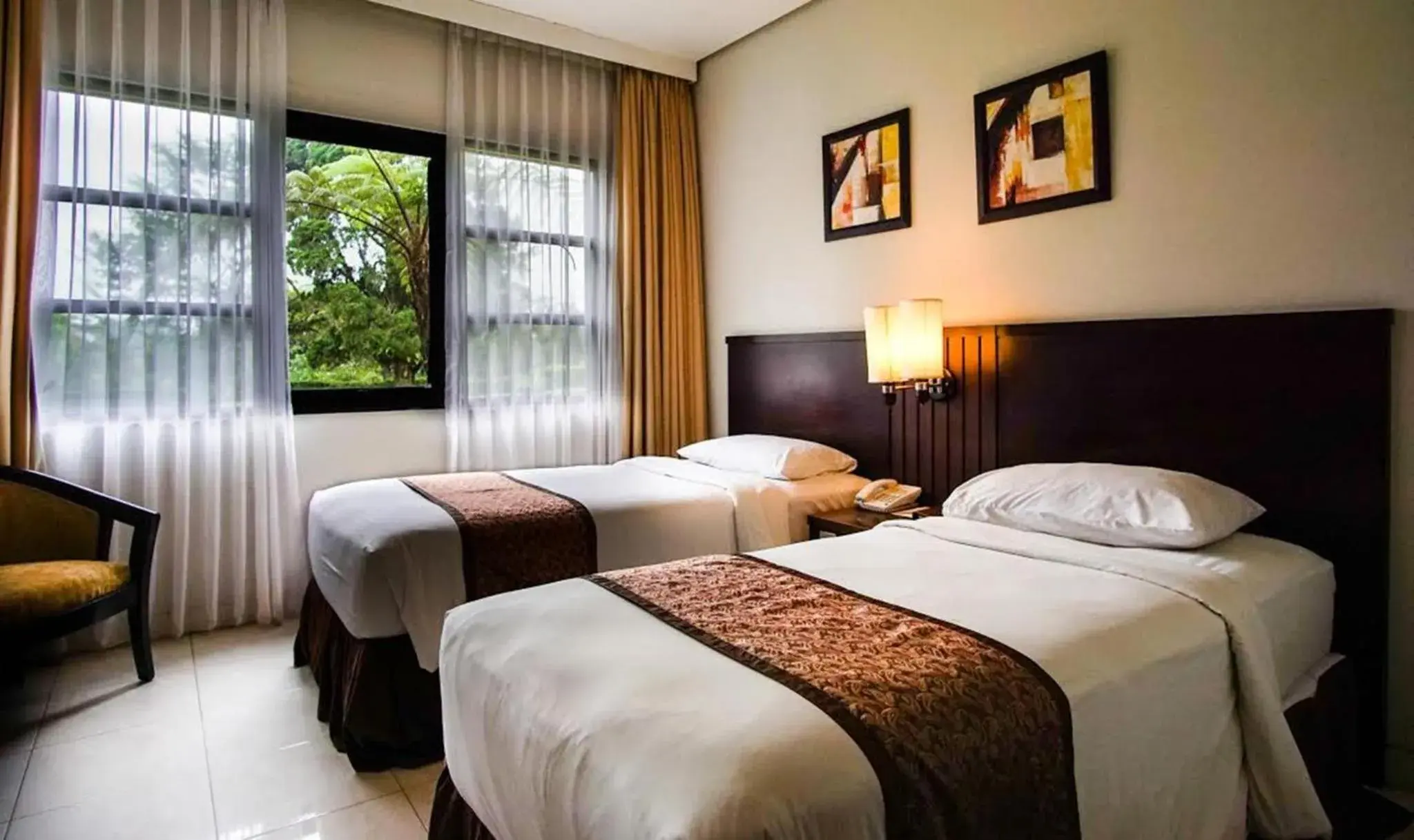 Bed in Sari Ater Hotel & Resort