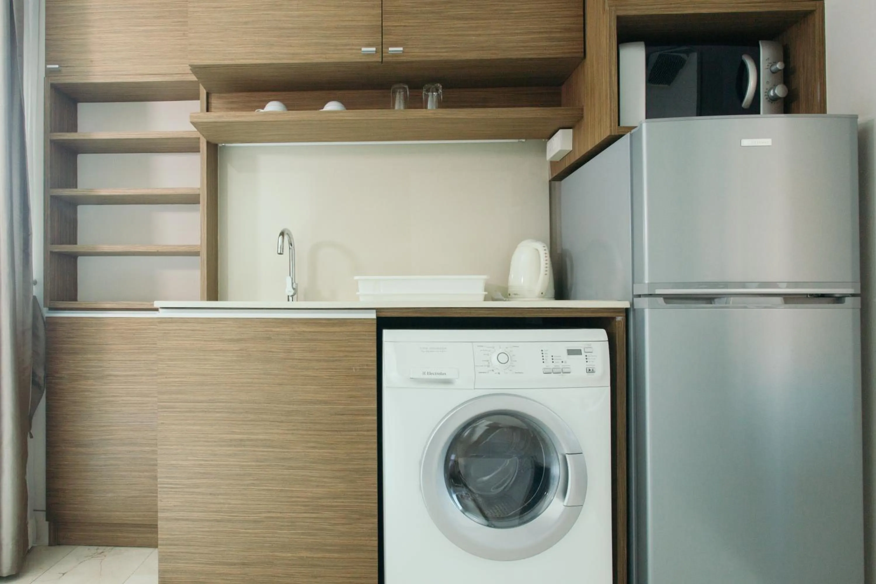 Kitchen or kitchenette in Thomson Residence Hotel