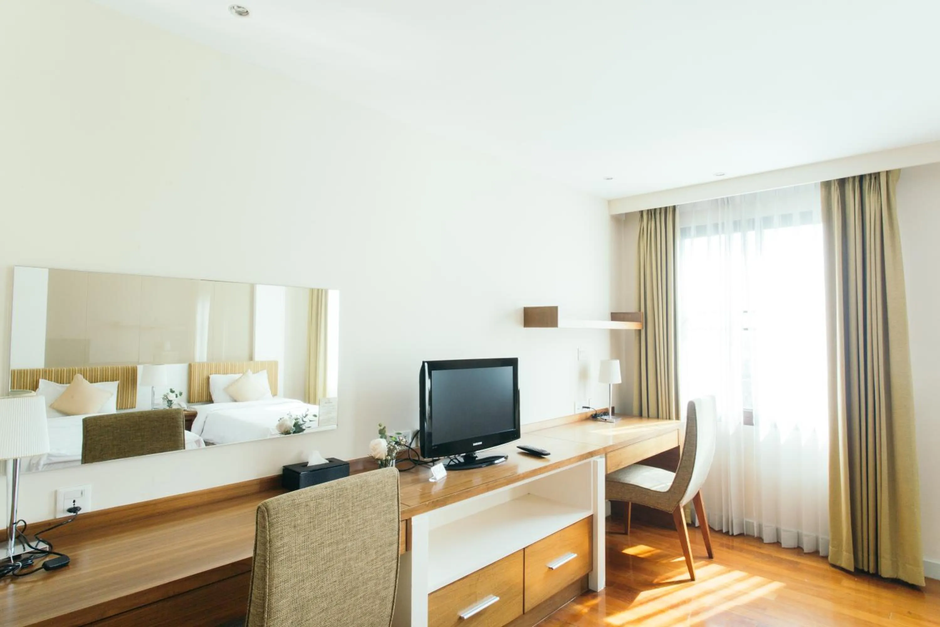 Bedroom in Thomson Residence Hotel