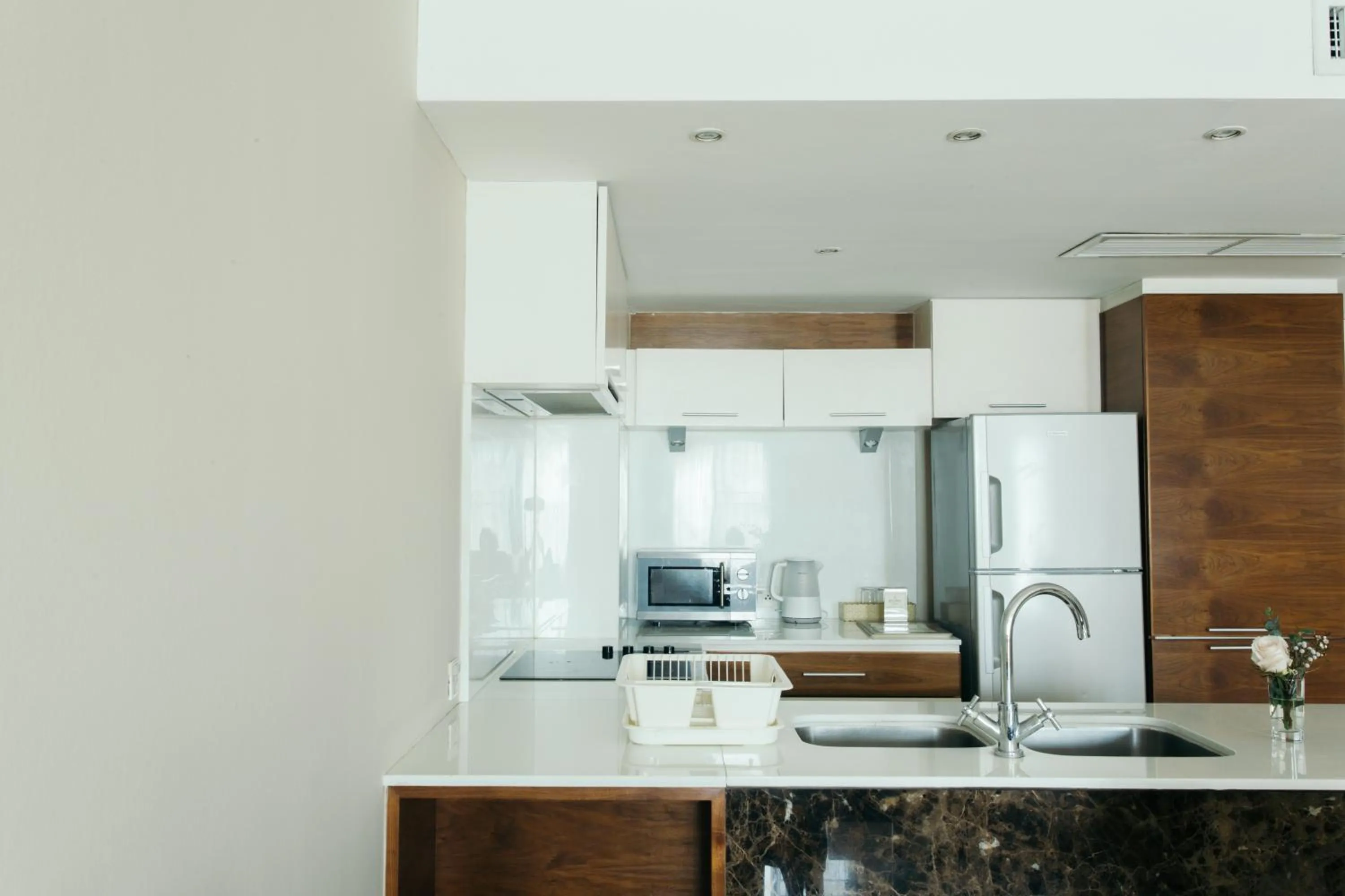 Kitchen or kitchenette in Thomson Residence Hotel