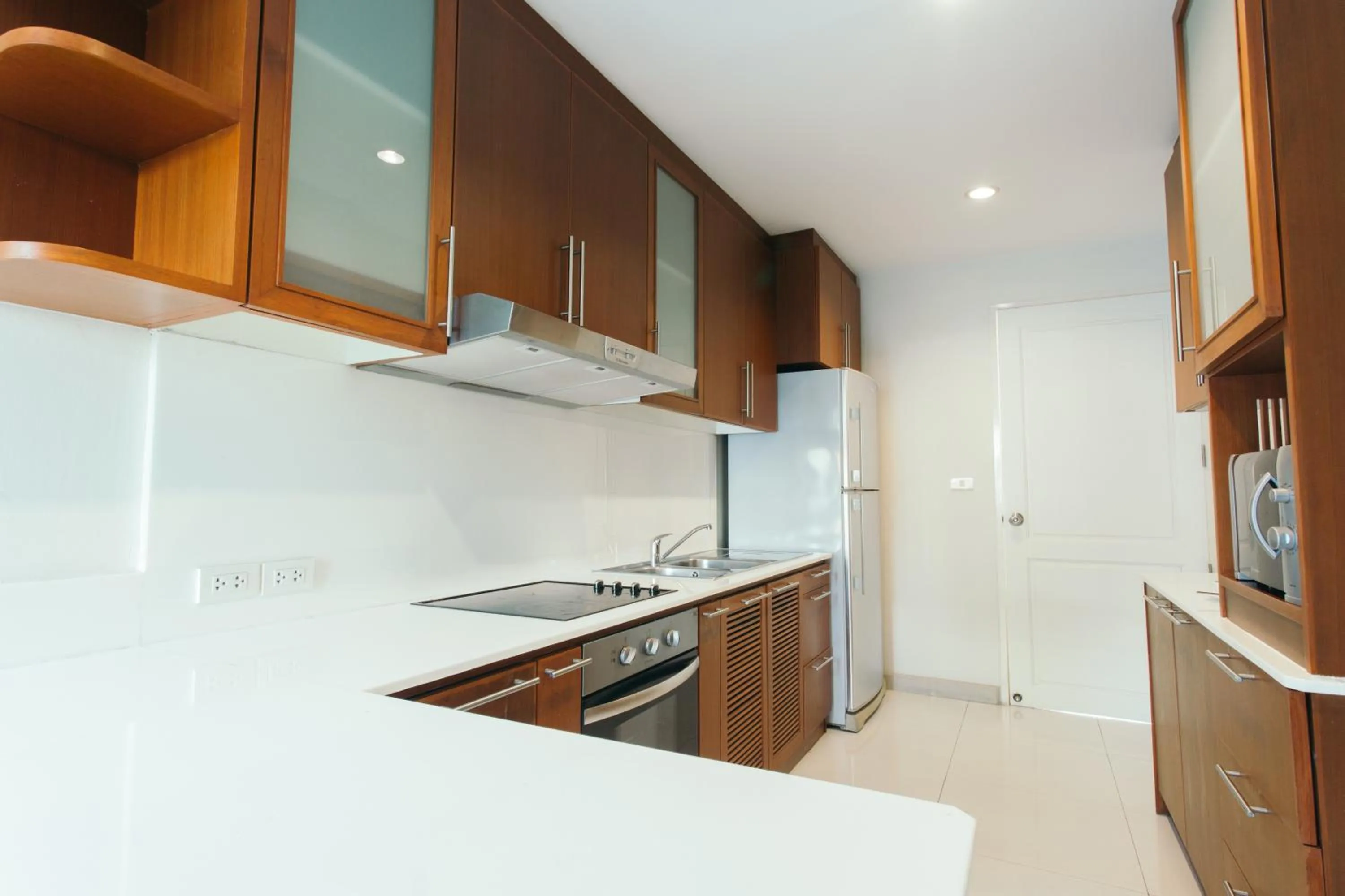 Kitchen or kitchenette in Thomson Residence Hotel