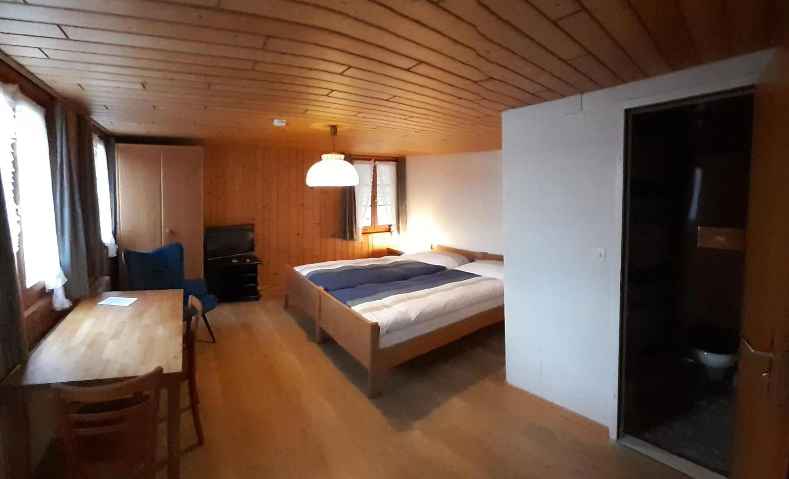 Photo of the whole room, Bed in B&B Rössli Gondiswil