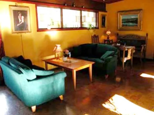 Communal lounge/ TV room in Midtnes Hotel
