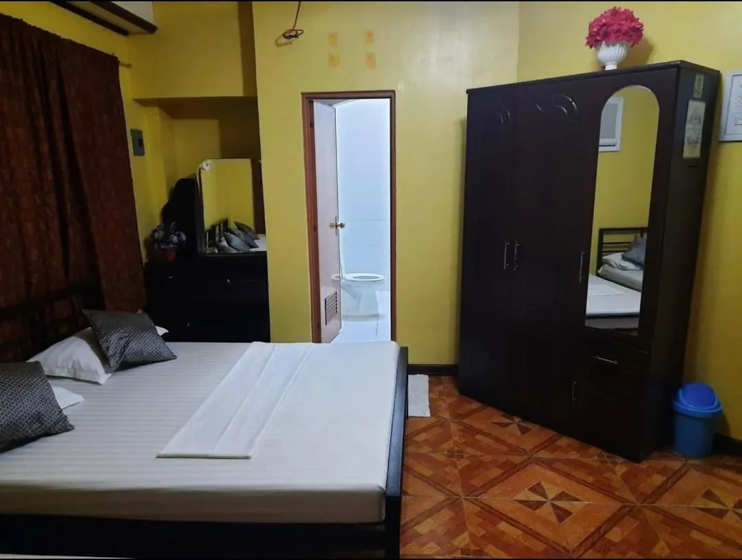 Bed in Carribean Transient House