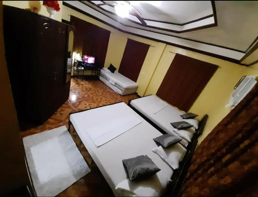 Bed in Carribean Transient House