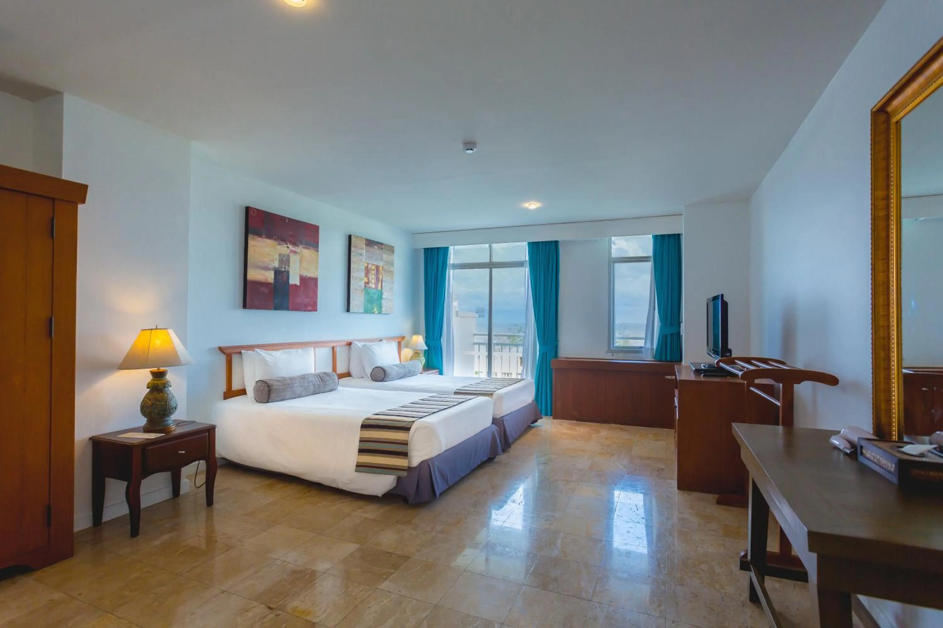Photo of the whole room, Bed in Waterfront Suites Phuket by Centara