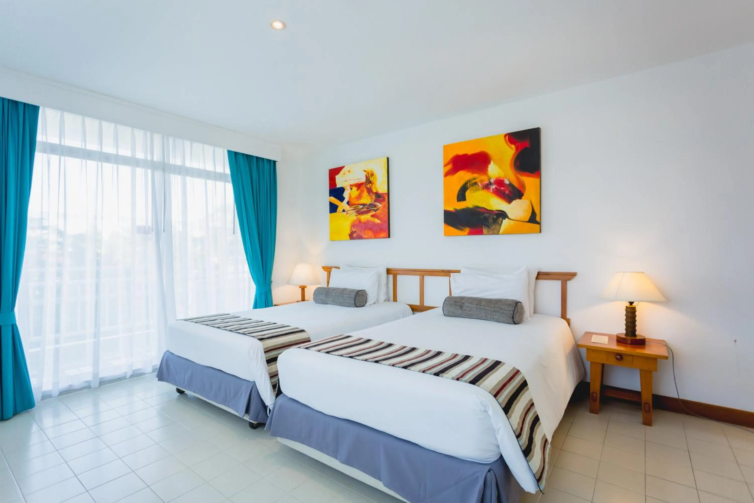 Photo of the whole room, Bed in Waterfront Suites Phuket by Centara