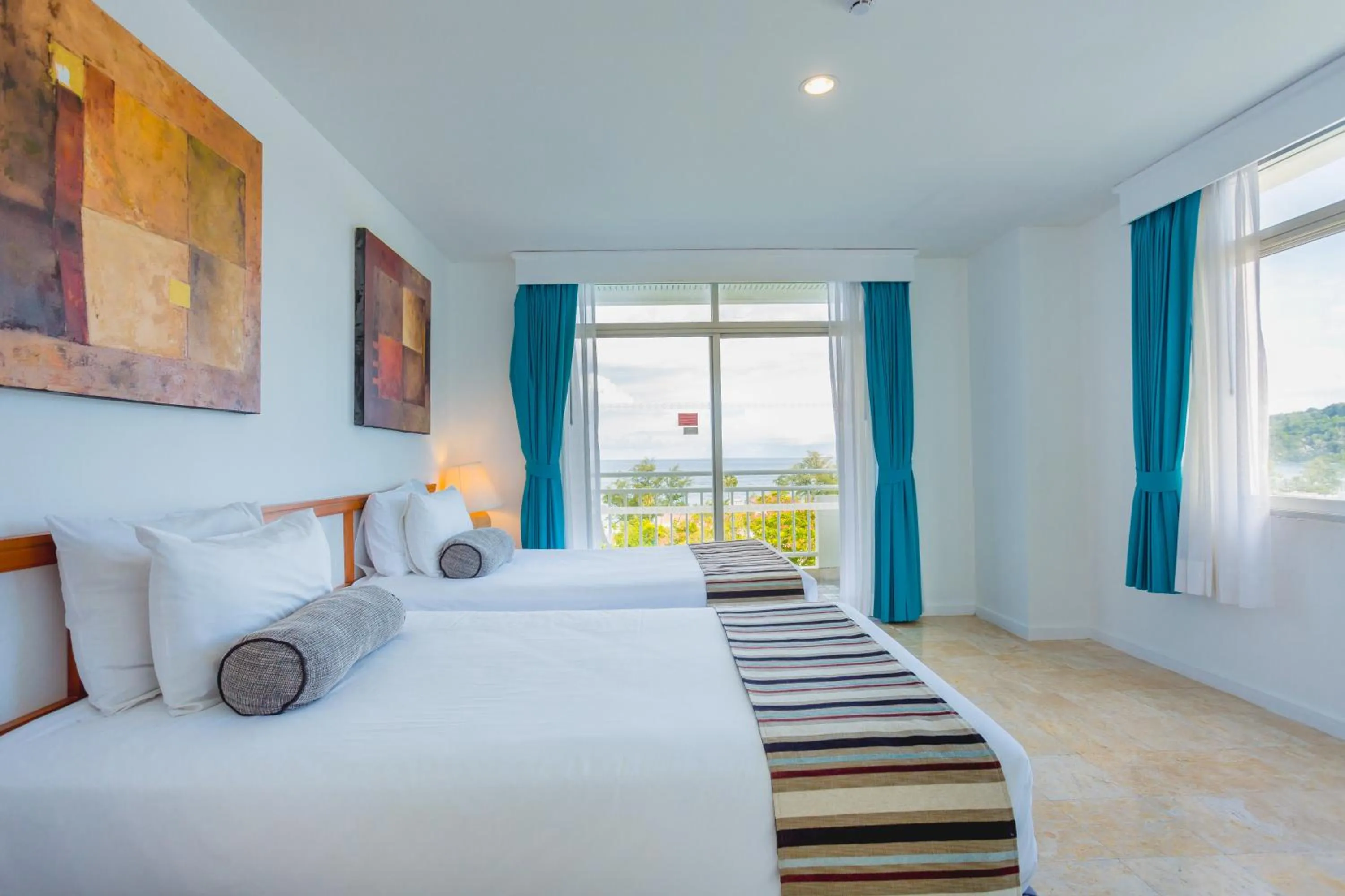 Photo of the whole room, Bed in Waterfront Suites Phuket by Centara