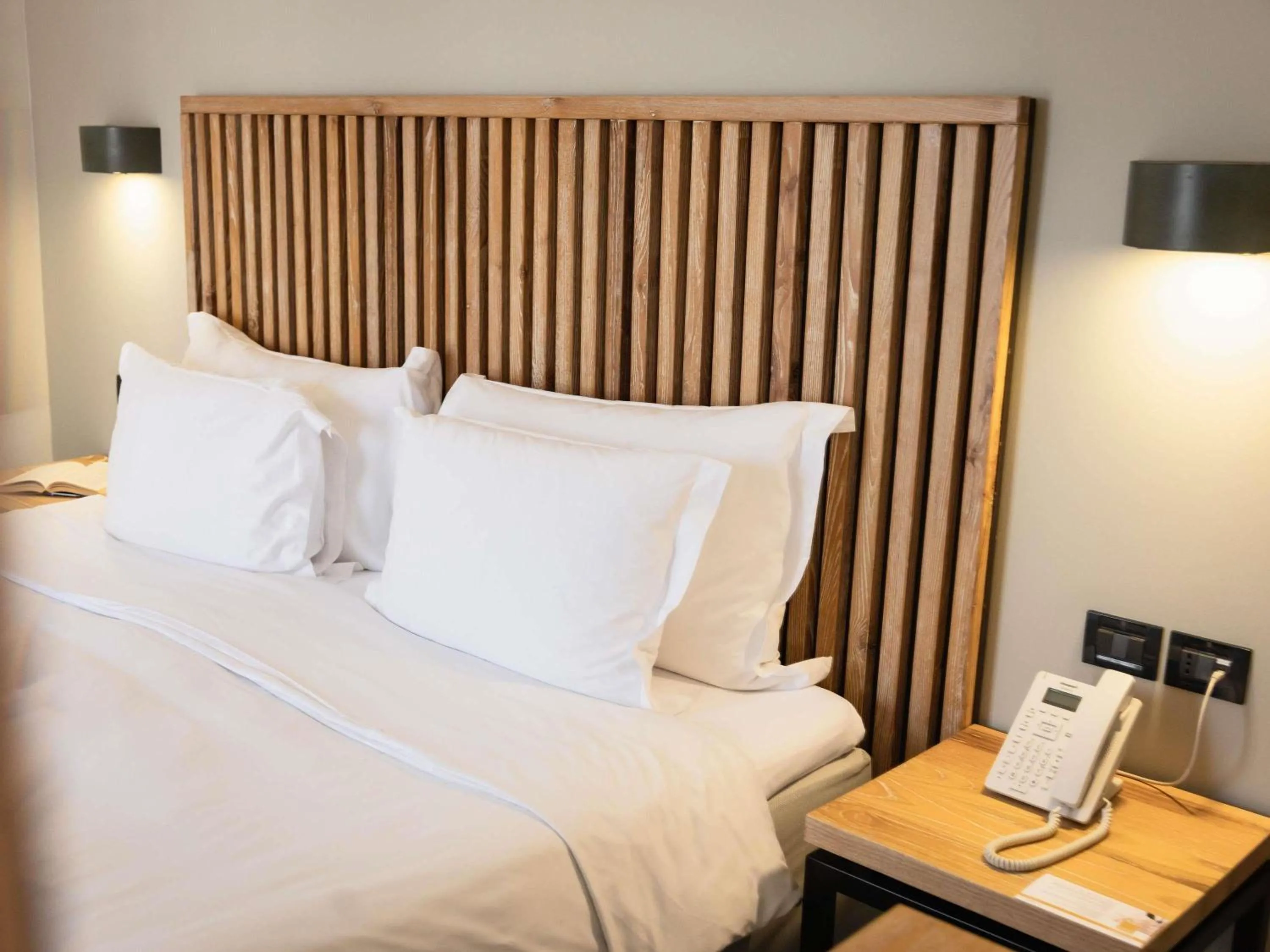 Bedroom, Bed in Movenpick Resort Agios Nikolaos Sivota