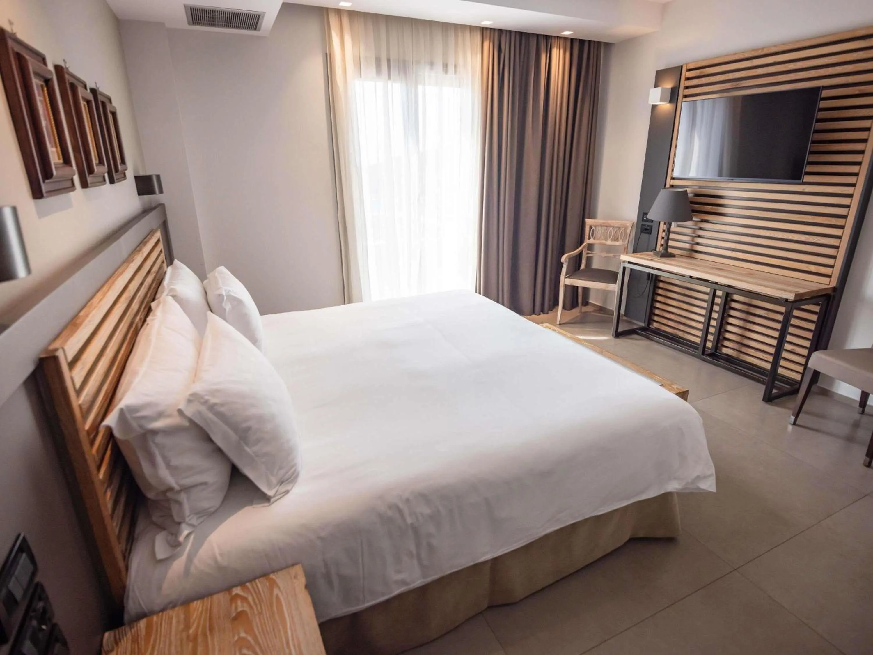 Bedroom, Bed in Movenpick Resort Agios Nikolaos Sivota