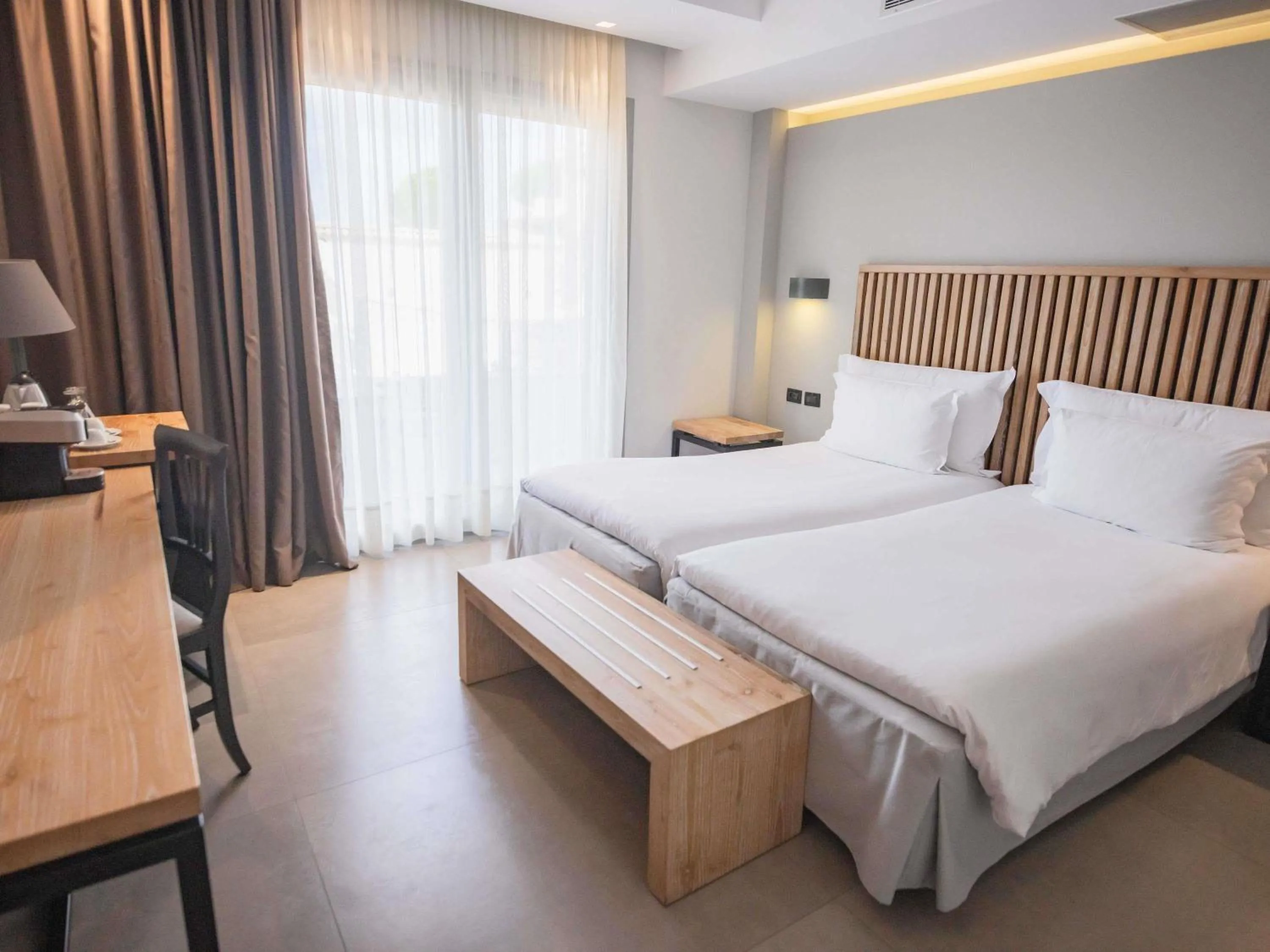 Bedroom, Bed in Movenpick Resort Agios Nikolaos Sivota