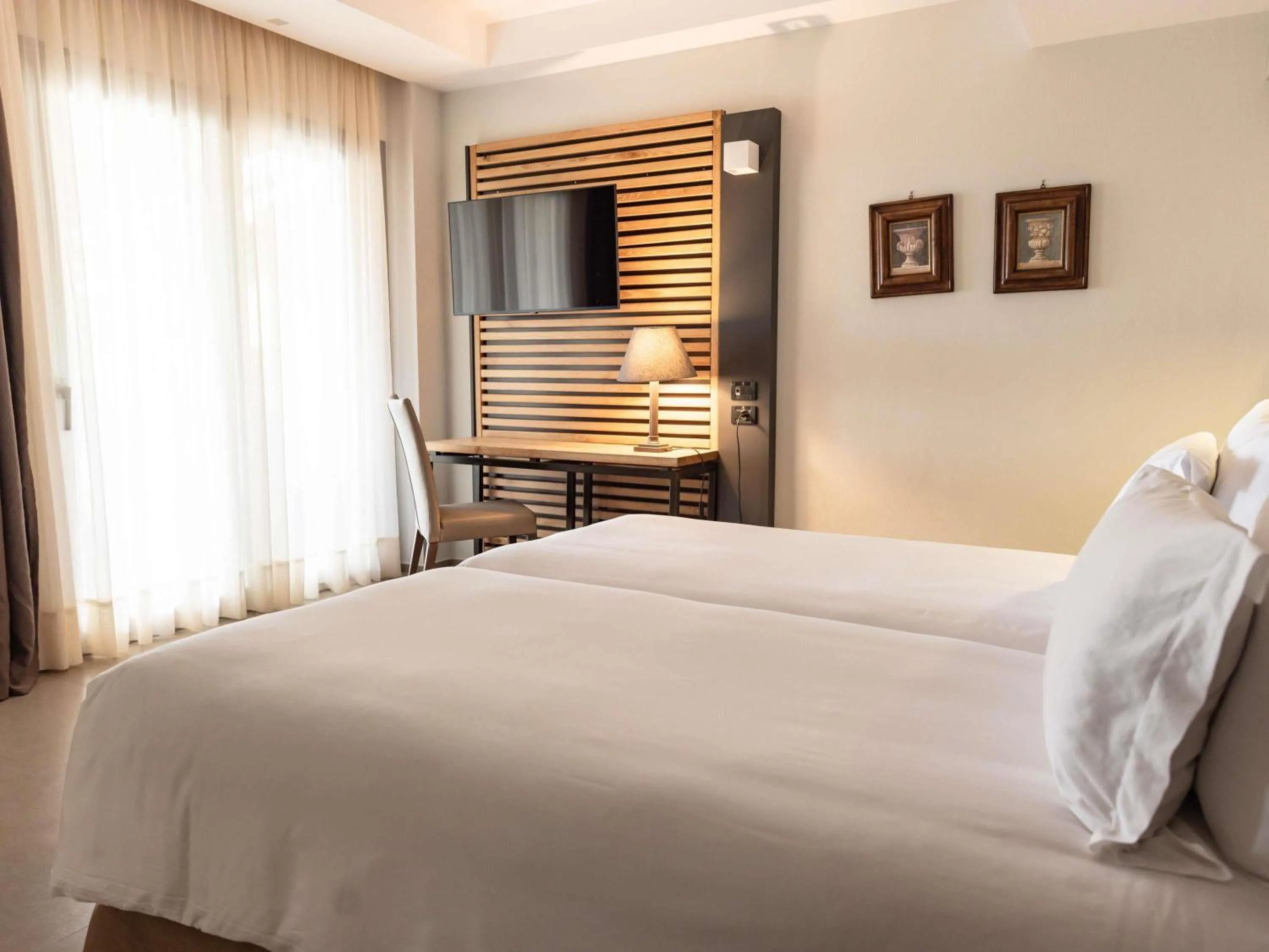 Bedroom, Bed in Movenpick Resort Agios Nikolaos Sivota