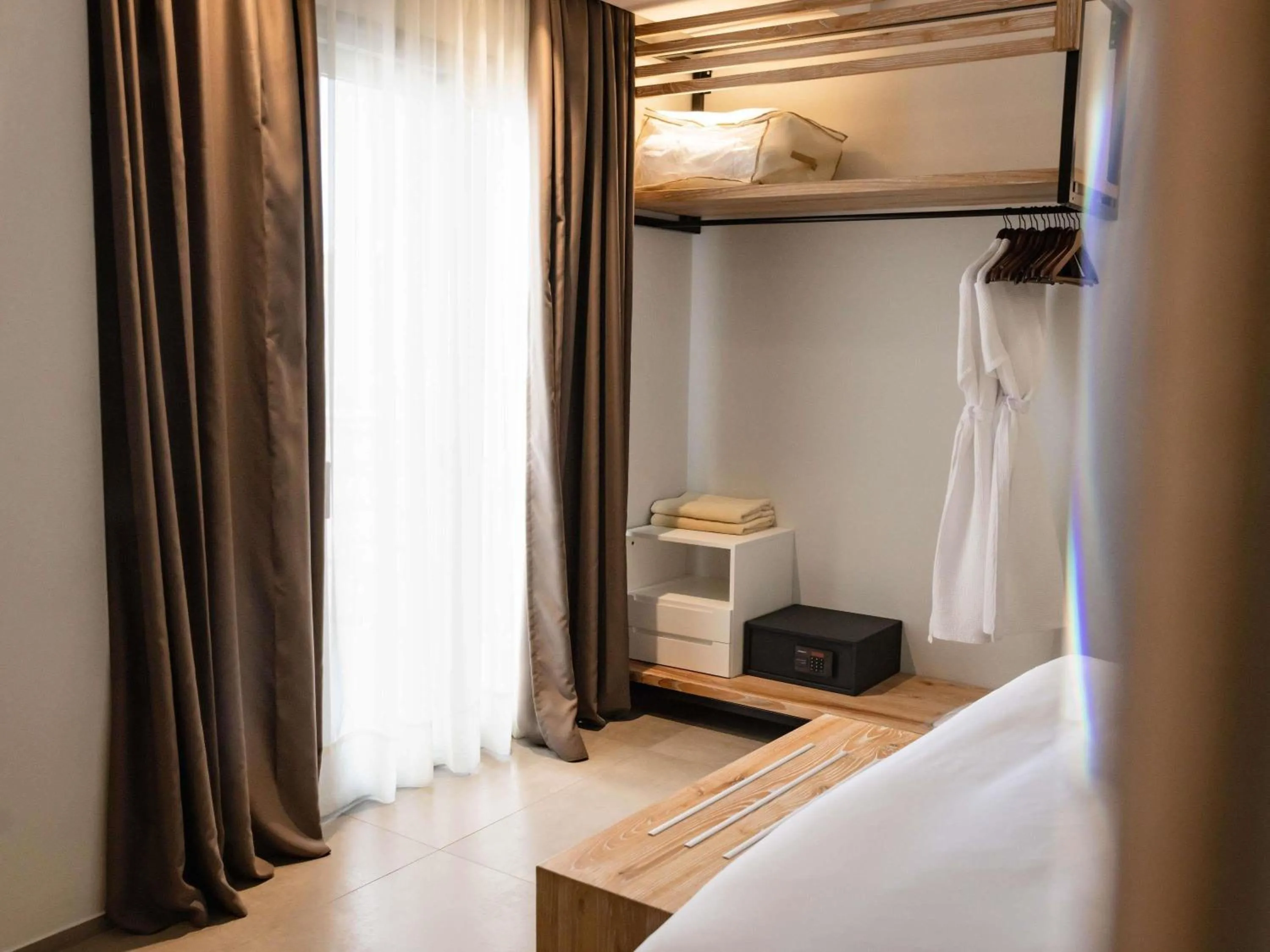 Bedroom, Bed in Movenpick Resort Agios Nikolaos Sivota