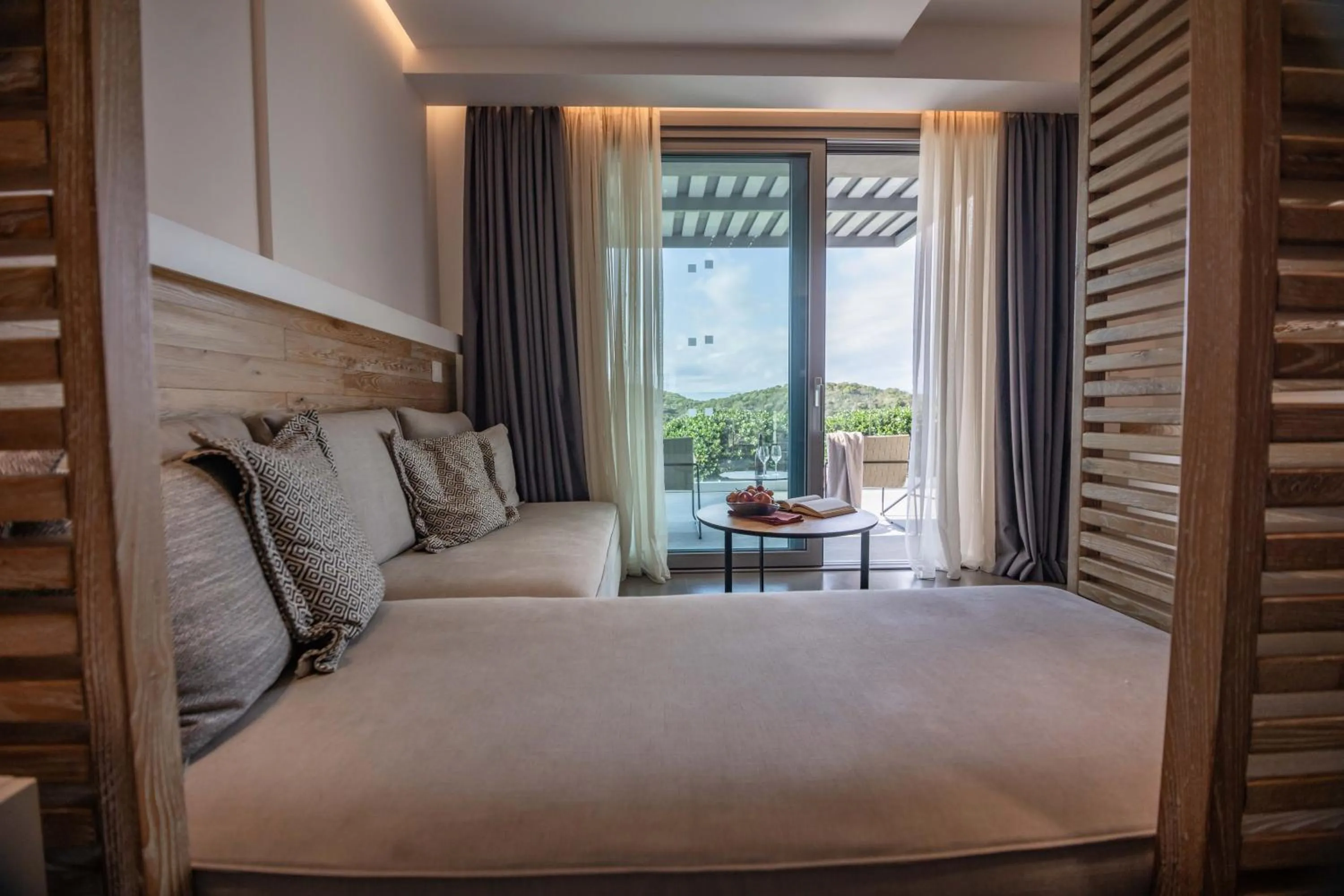 View (from property/room), Bed in Movenpick Resort Agios Nikolaos Sivota