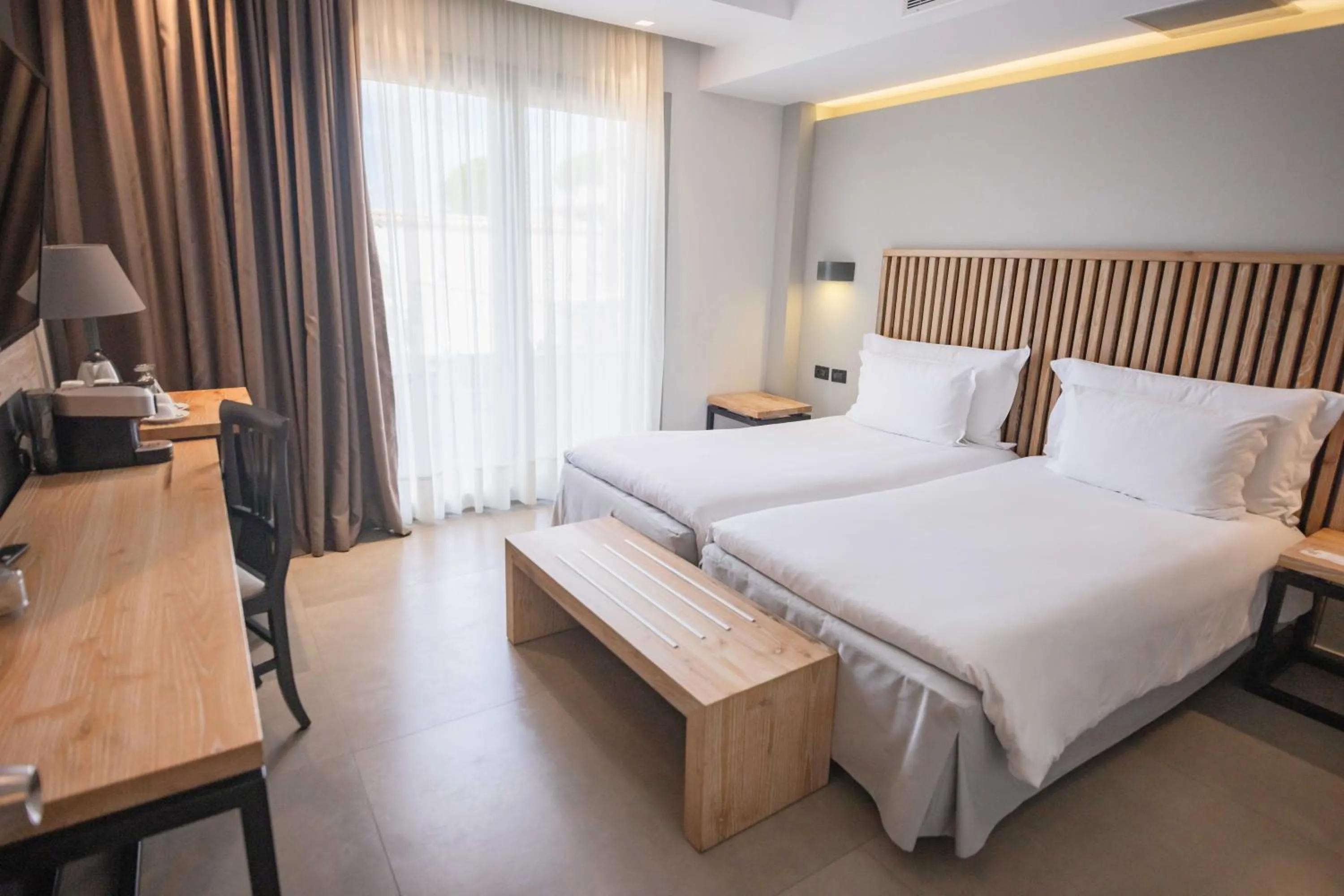 Bed in Movenpick Resort Agios Nikolaos Sivota