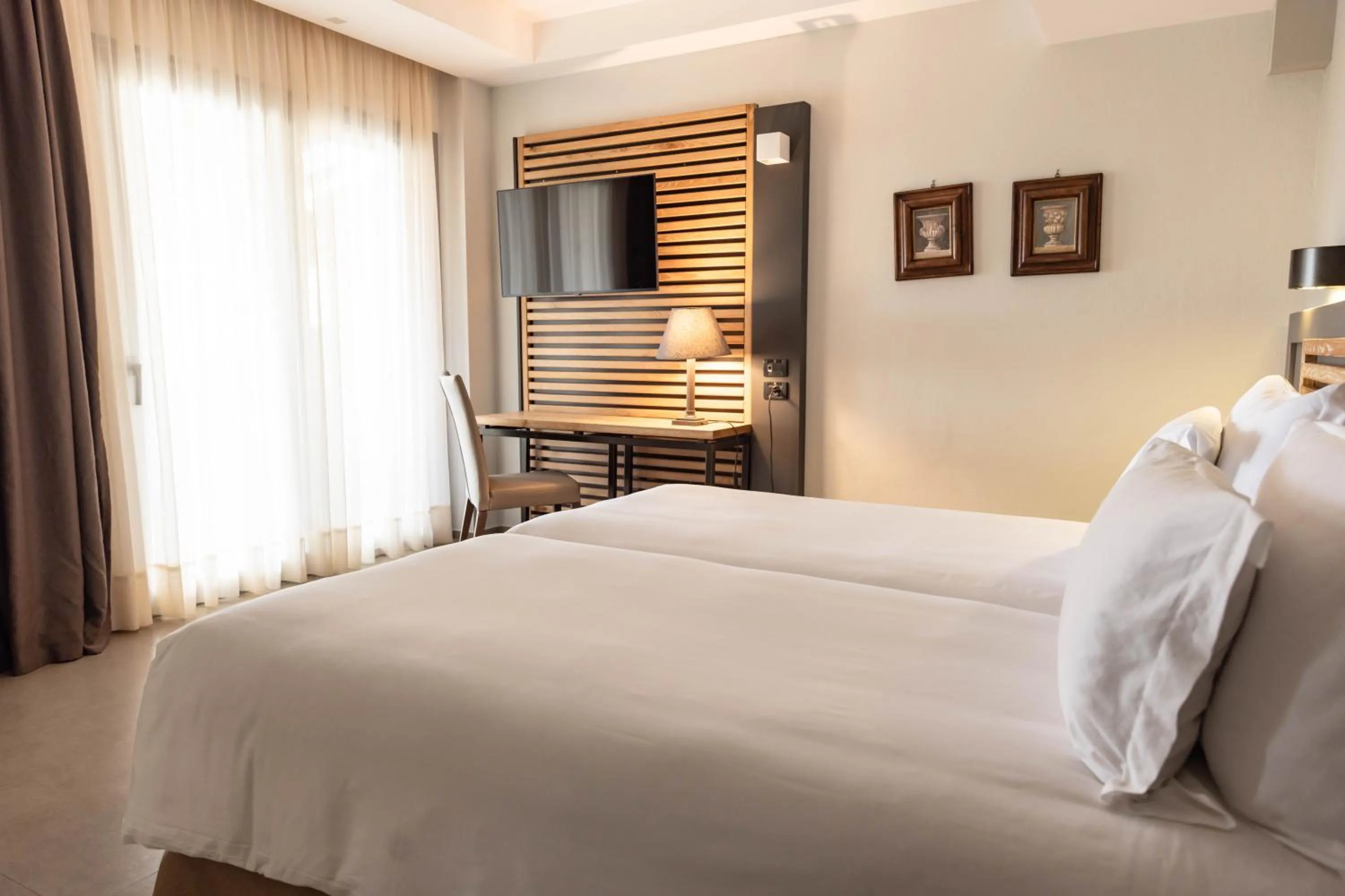 Bed in Movenpick Resort Agios Nikolaos Sivota